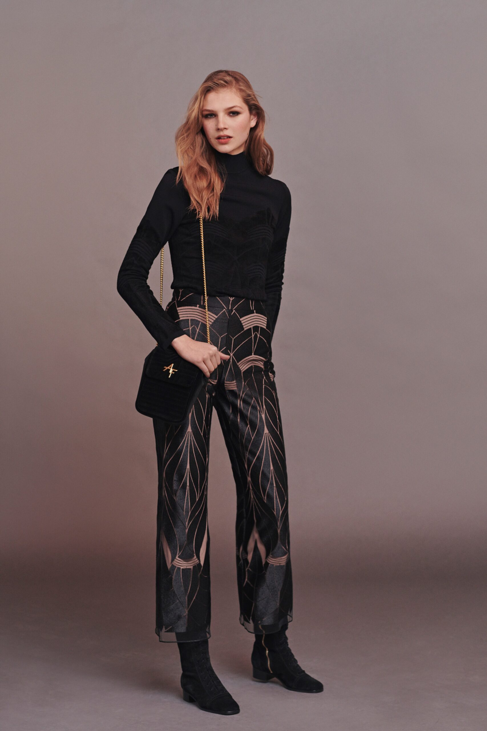 black silk fitted top with wide-leg pants