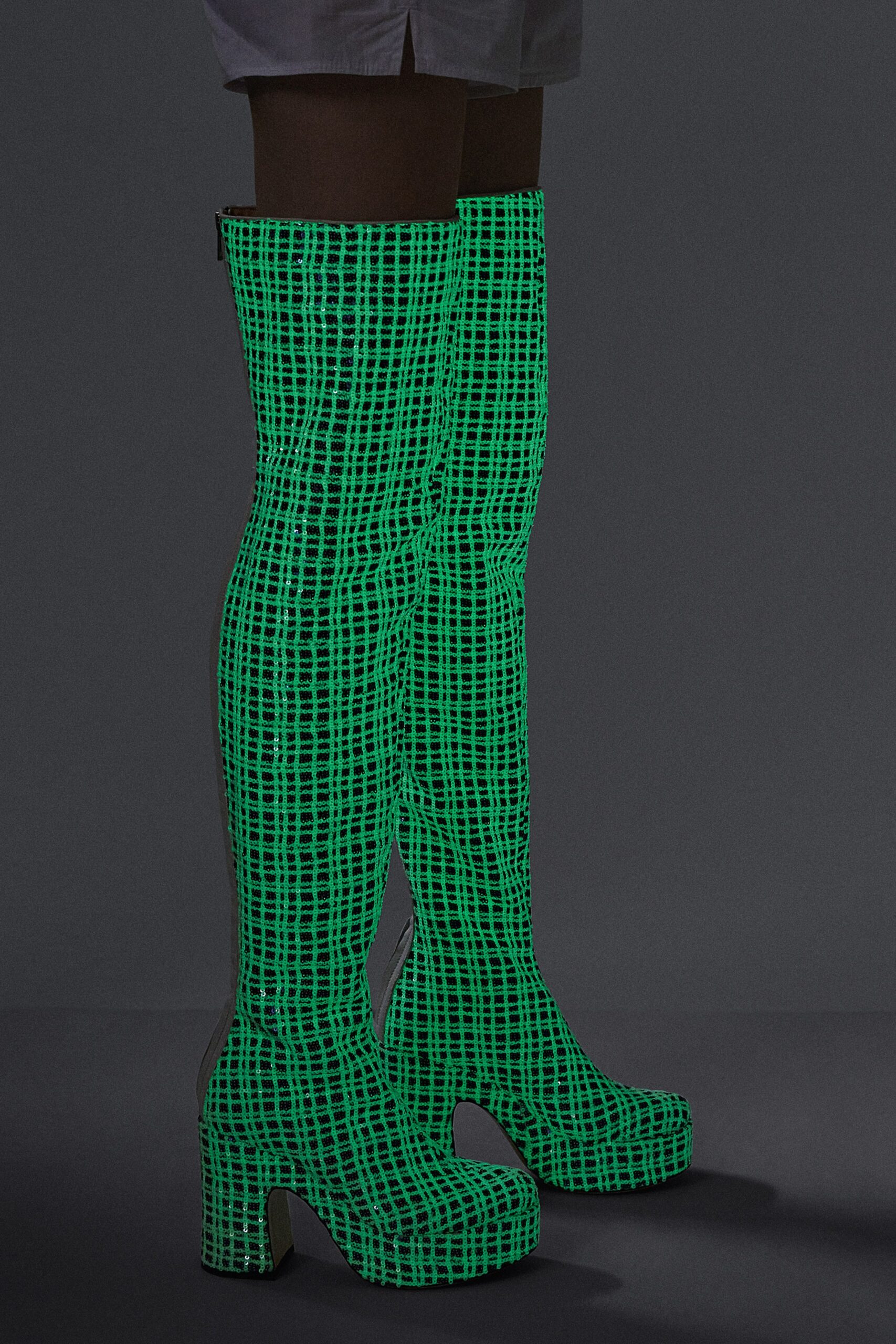 green vinyl fitted boots