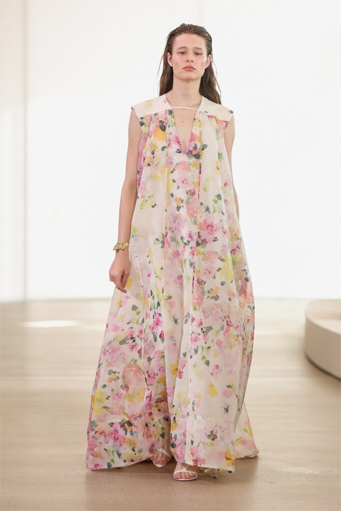 A relaxed multicolor silk sleeveless dress with a V-neckline and tiered design.