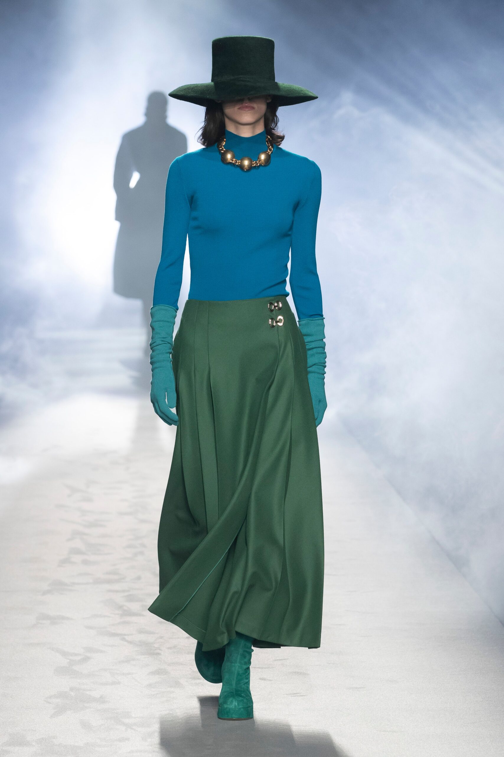 blue fitted top with green skirt