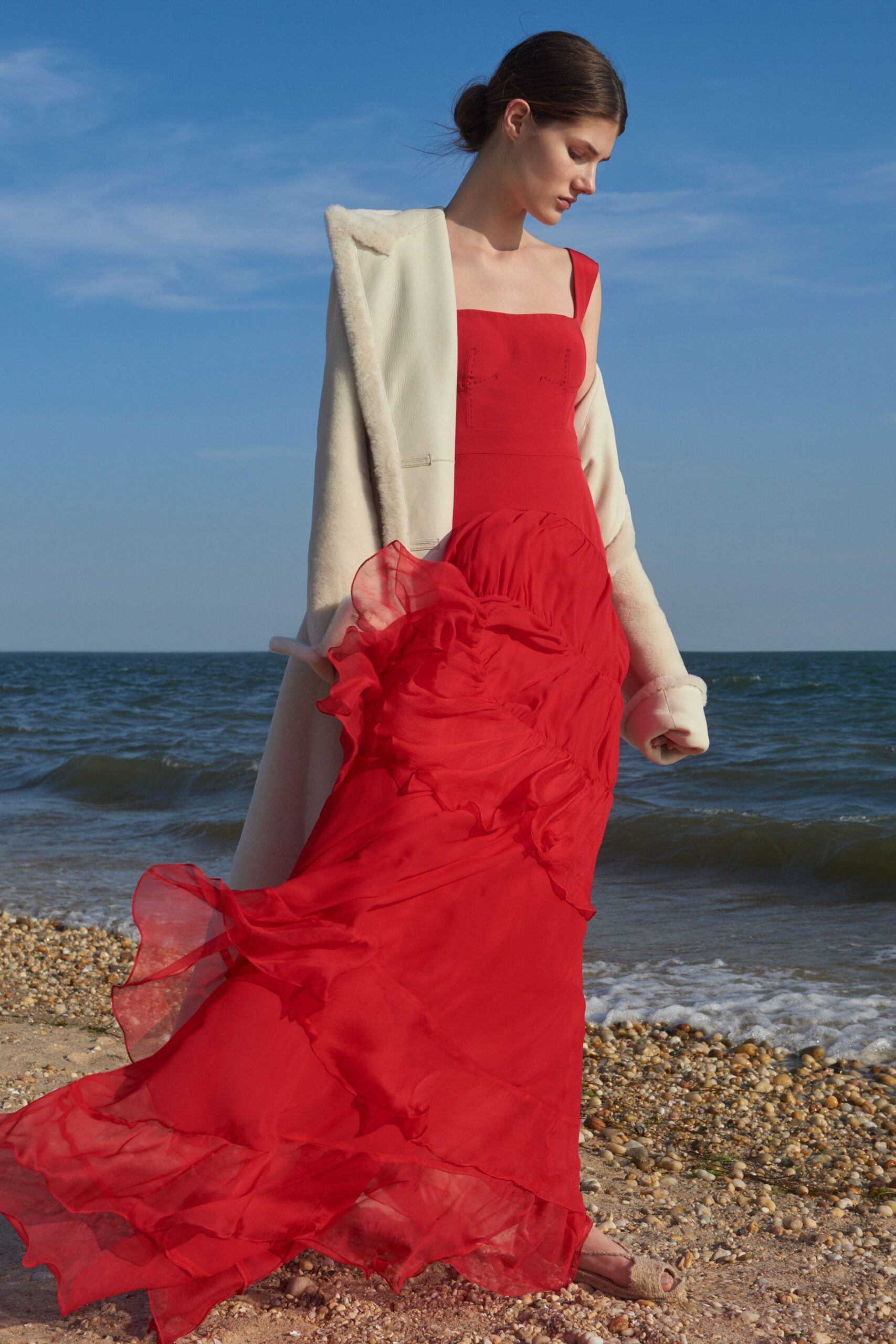 red chiffon gown with white coat