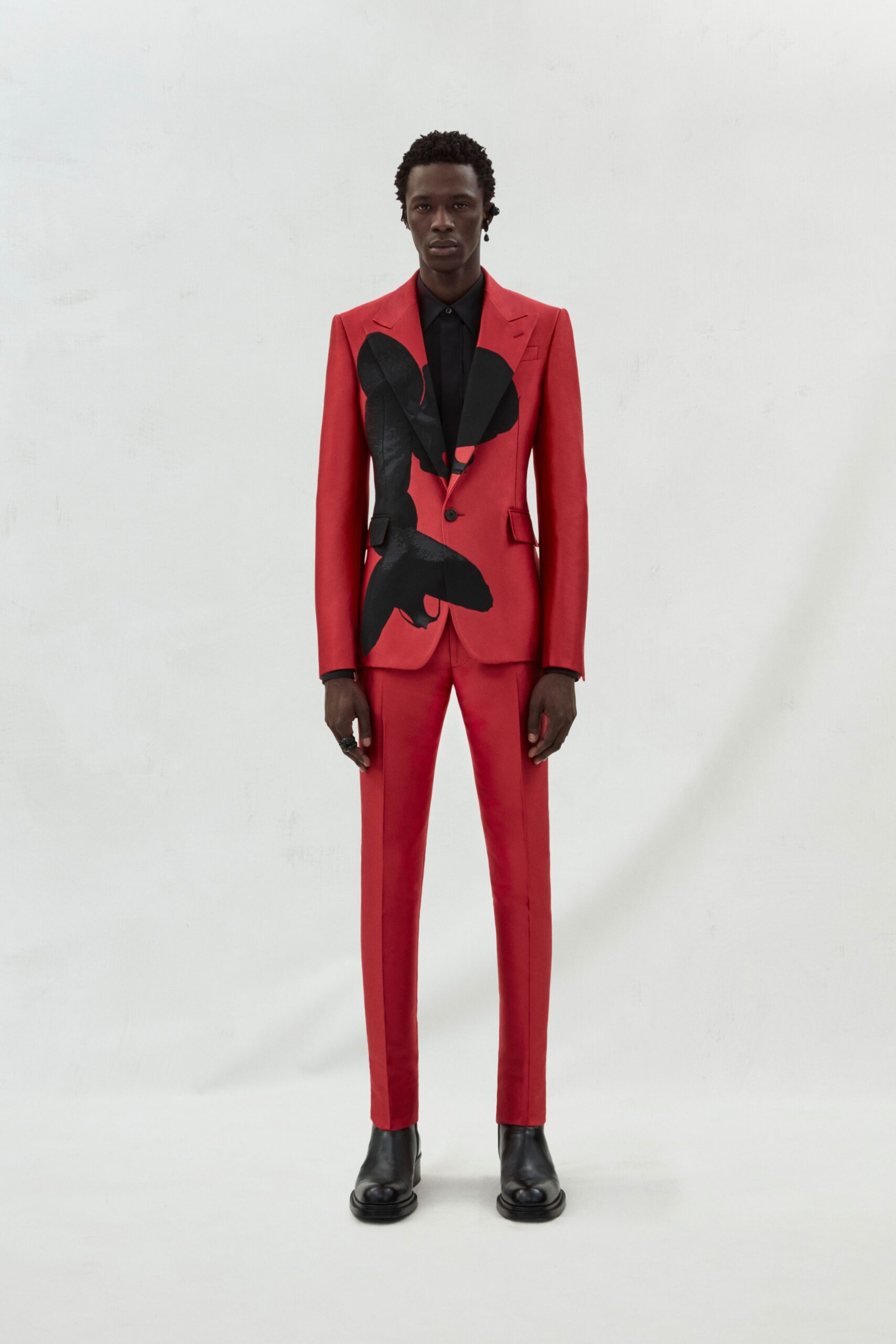 red tailored suit with print