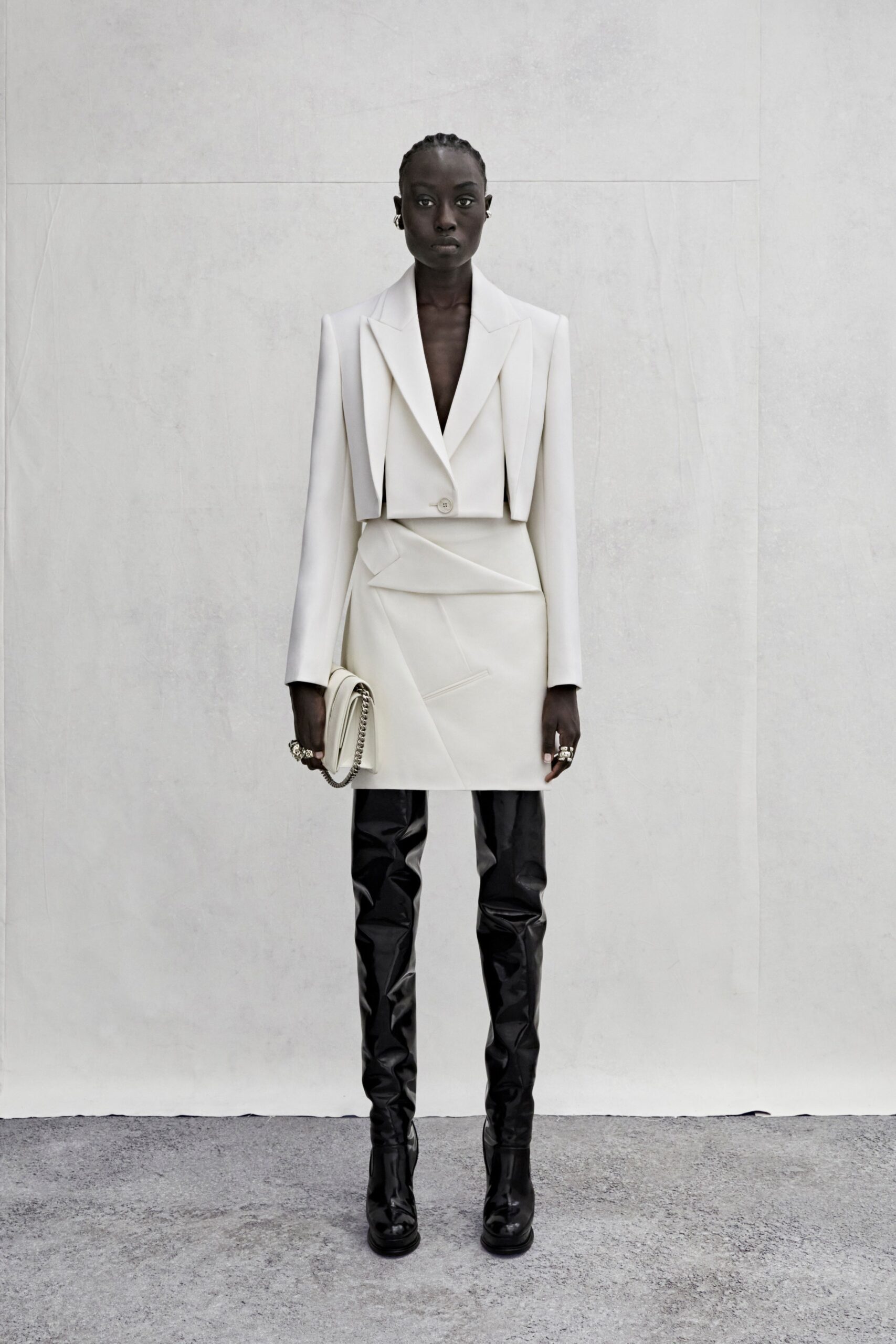 white tailored blazer with black pants