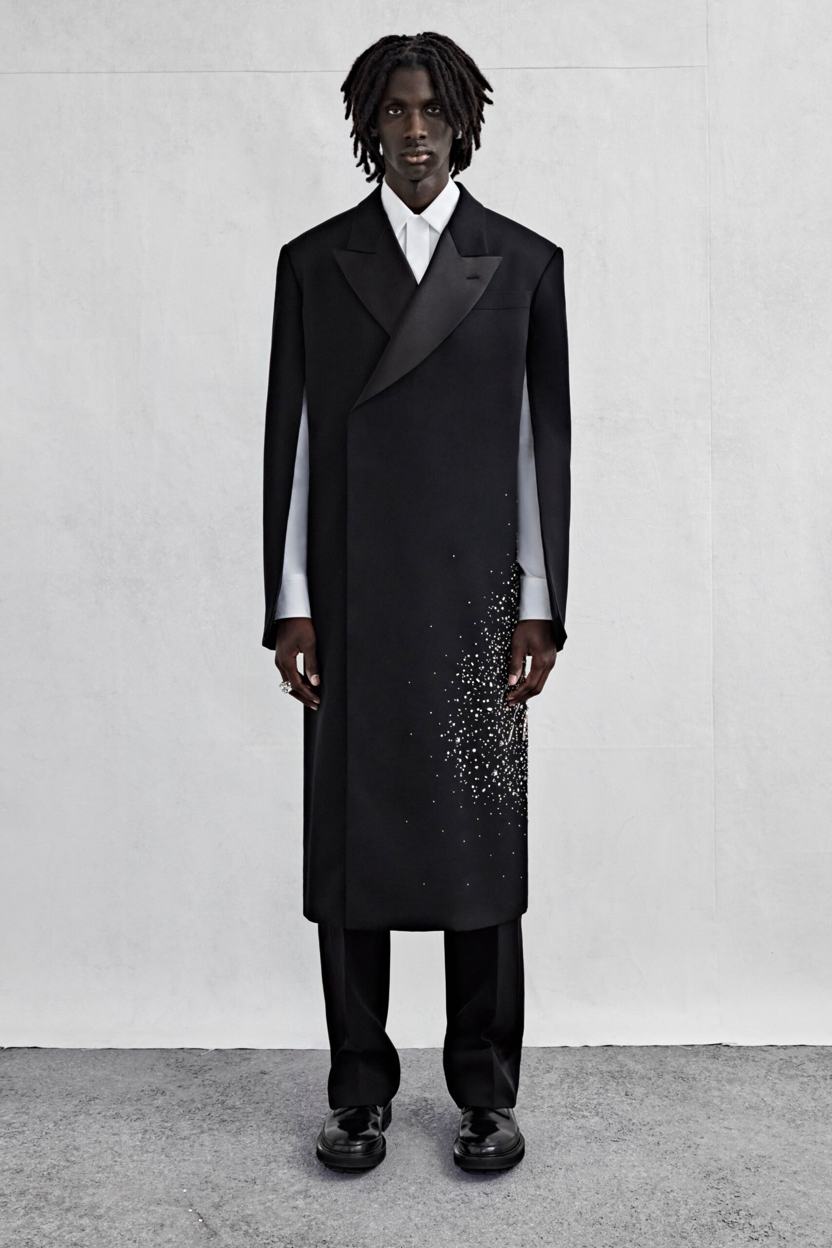 black wool long-sleeve collared fitted draped zippered coat