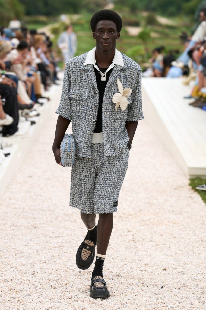 A relaxed-fit blue and white checked short-sleeve shirt paired with matching shorts.