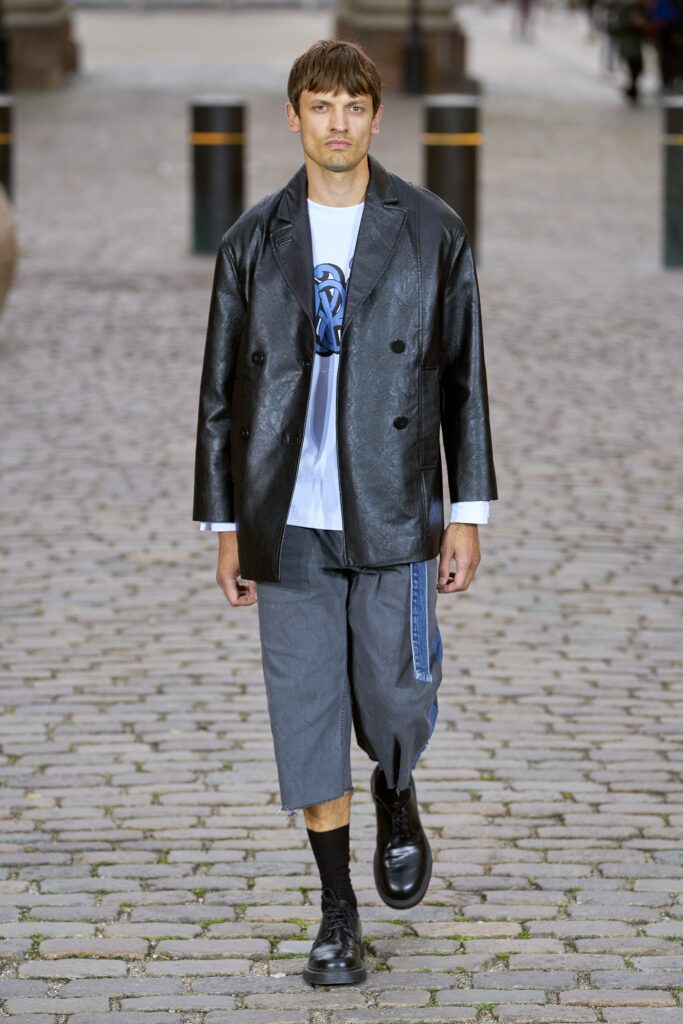 black leather jacket with t-shirt and shorts