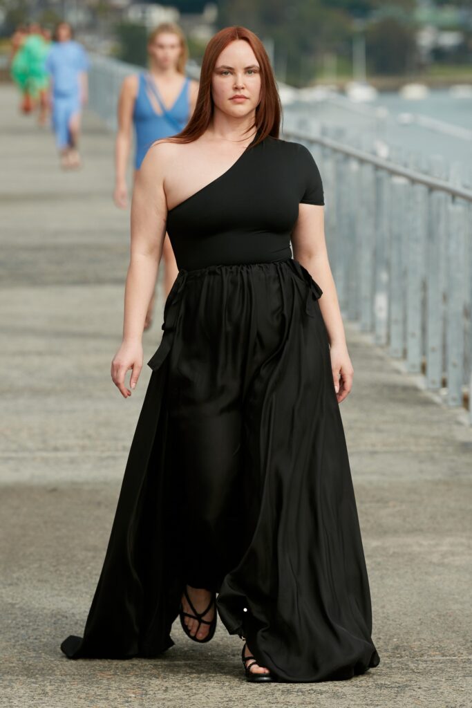 black asymmetric top and tiered skirt