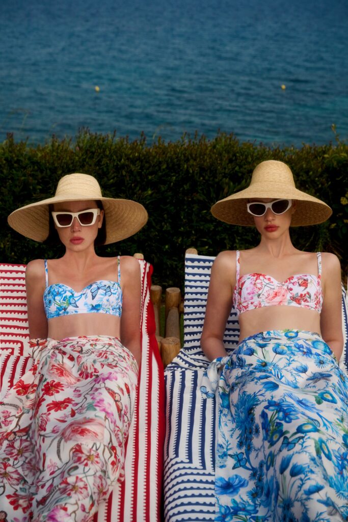A fitted floral bikini paired with a high-waisted skirt, perfect for a summer day by the sea.