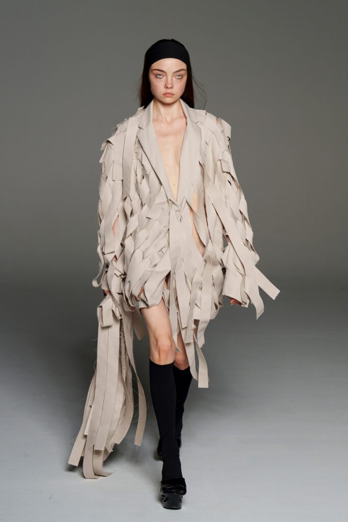 beige fringed sleeveless dress