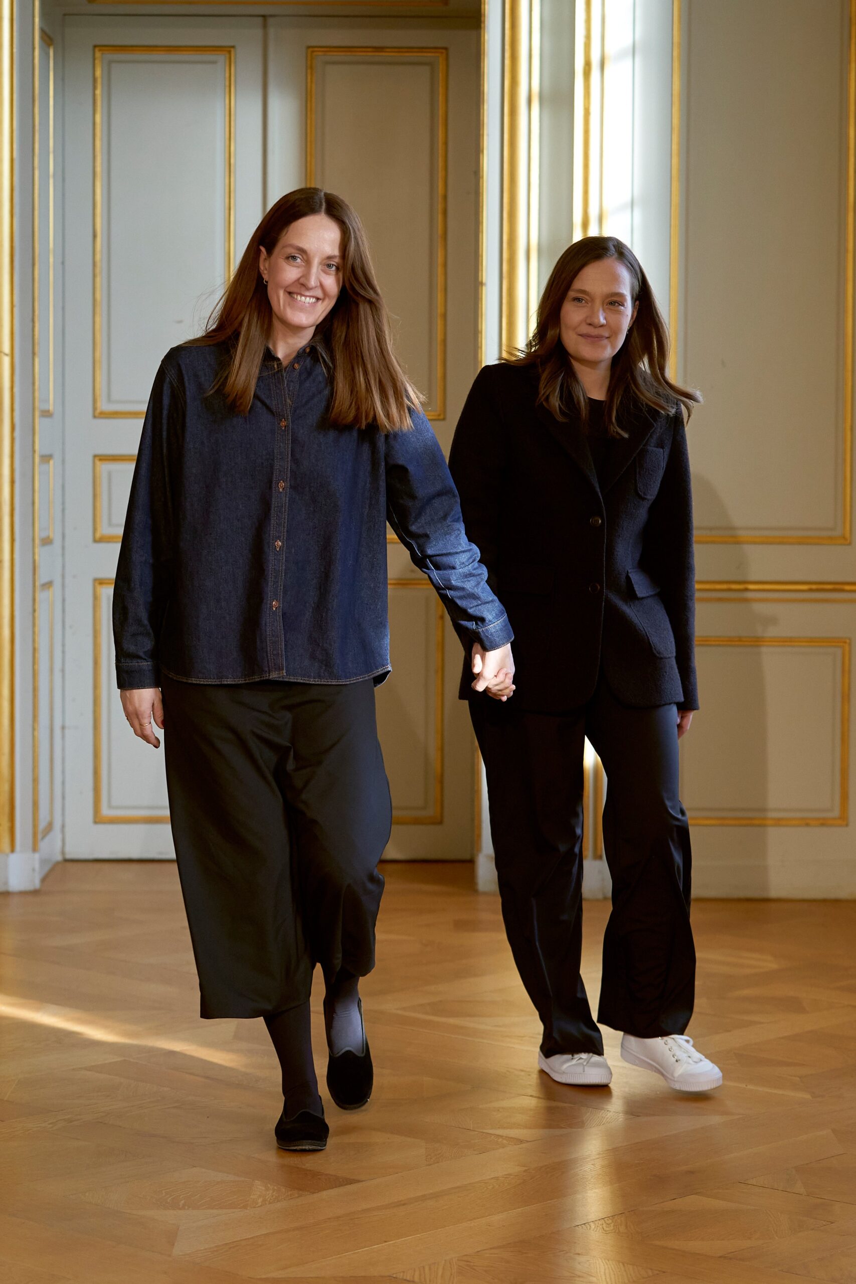 blue denim shirt and black pants