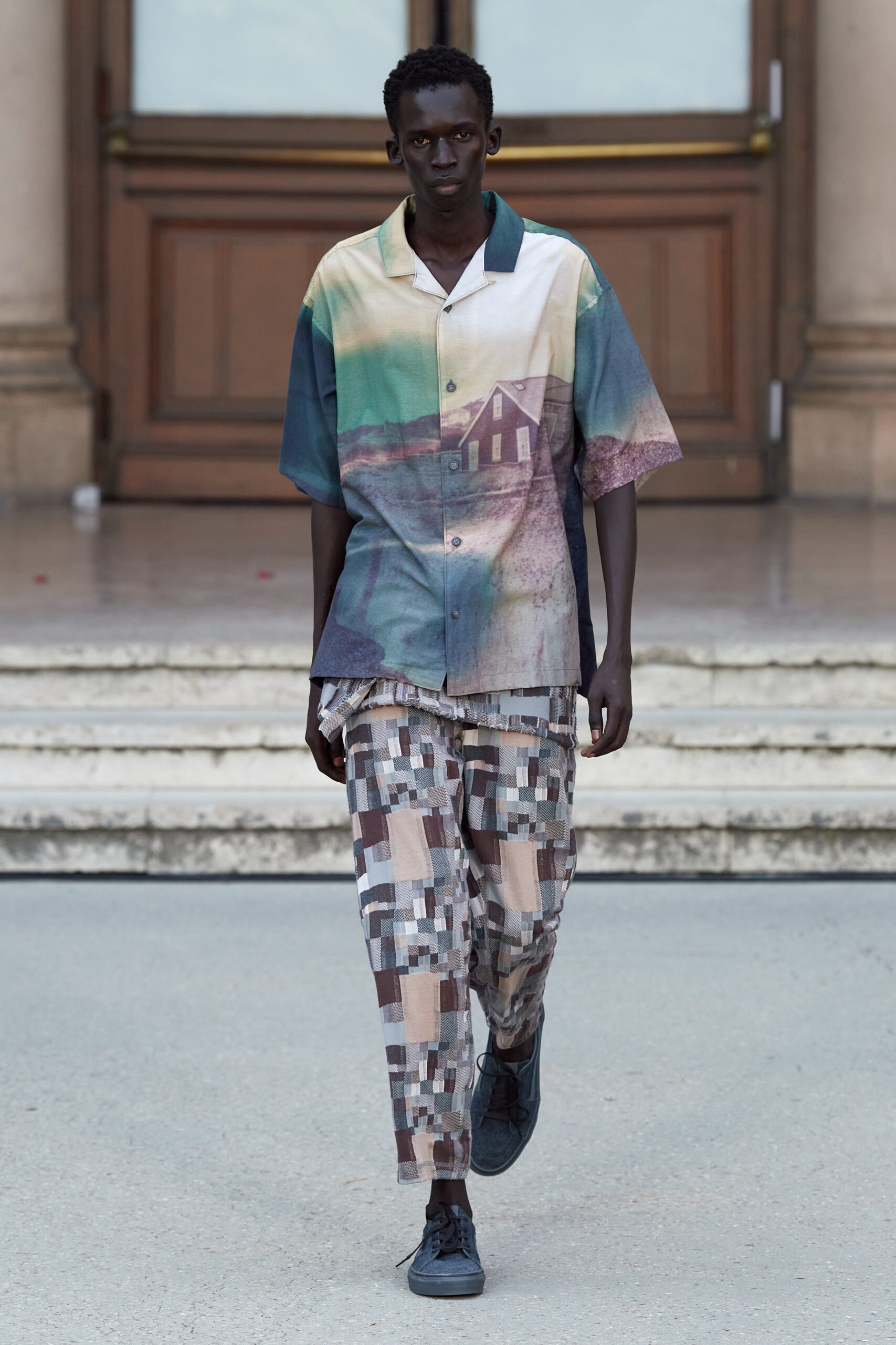 A relaxed-fit multicolor printed shirt with short sleeves and matching printed pants.