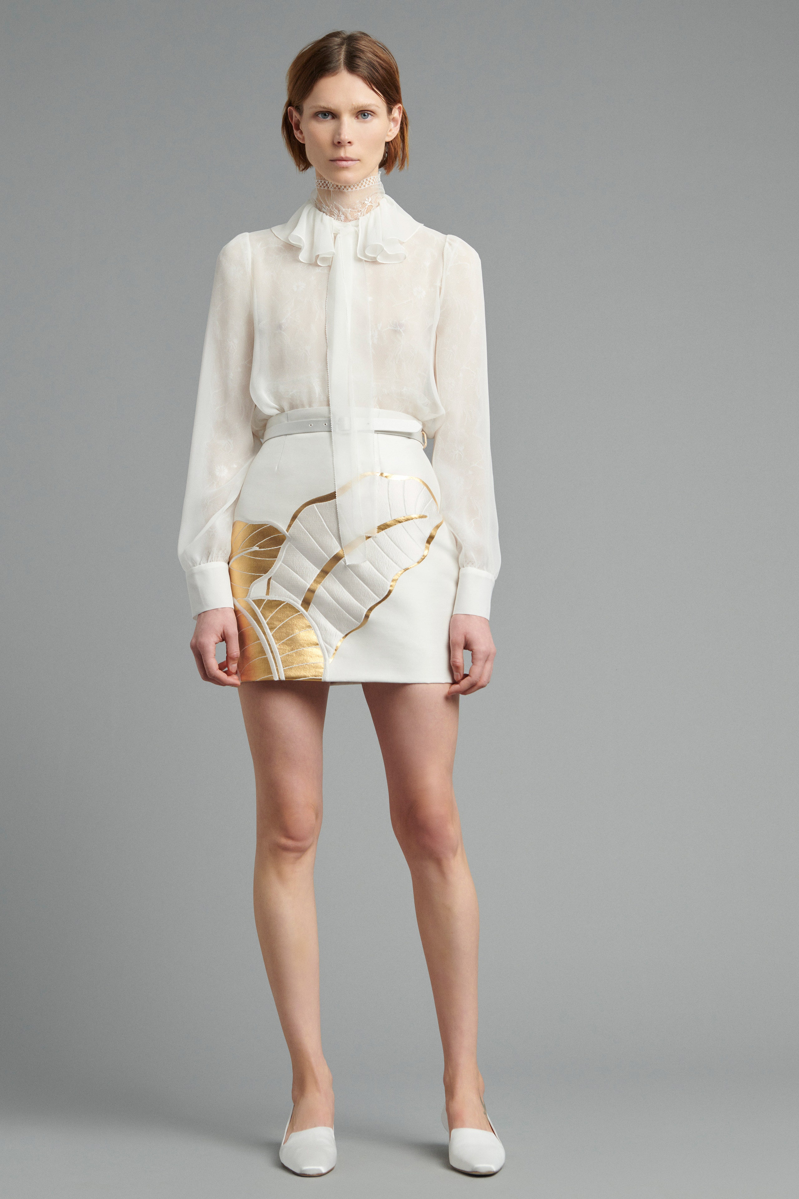white silk long-sleeve collared fitted ruffled blouse