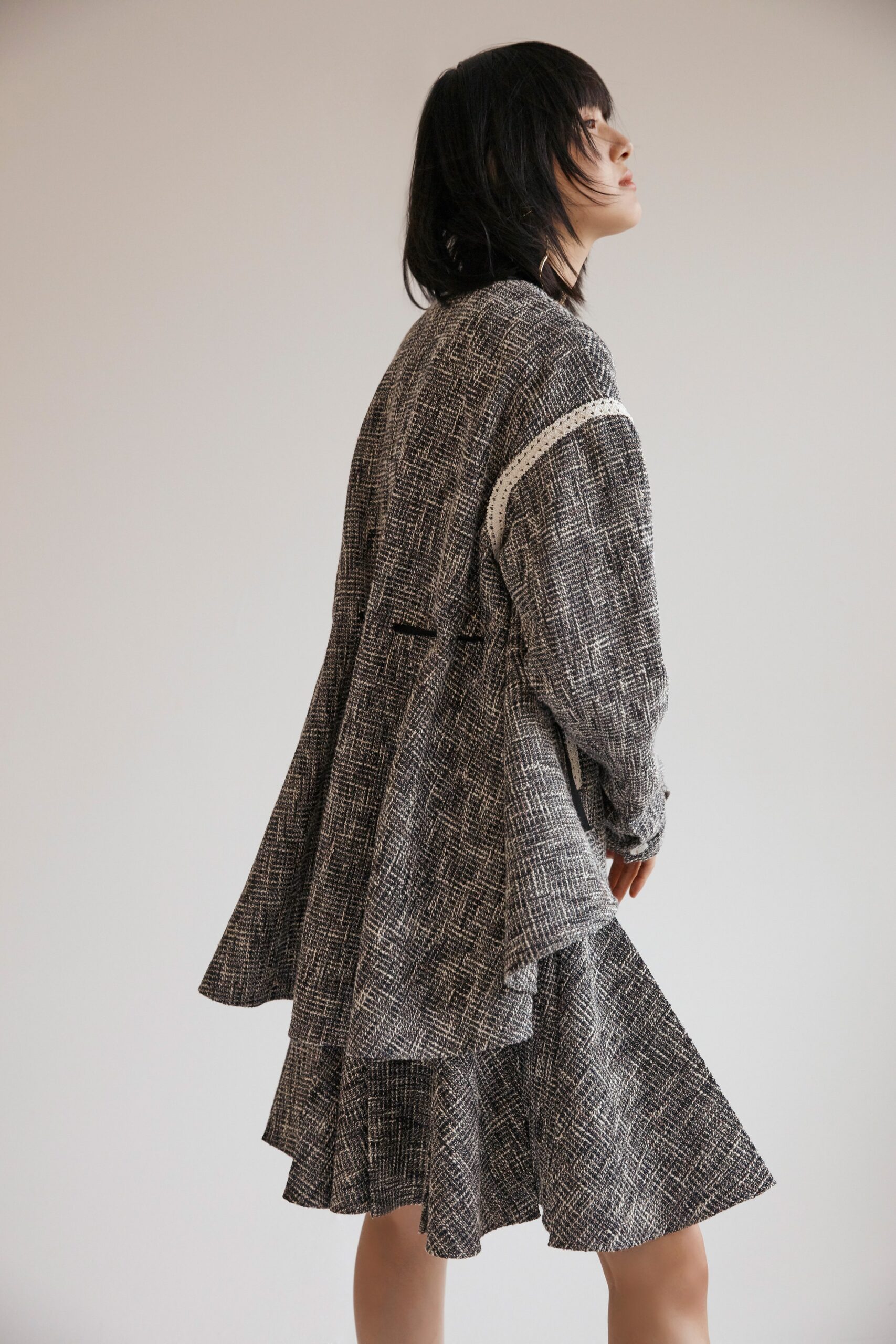 black and white layered midi dress with relaxed jacket