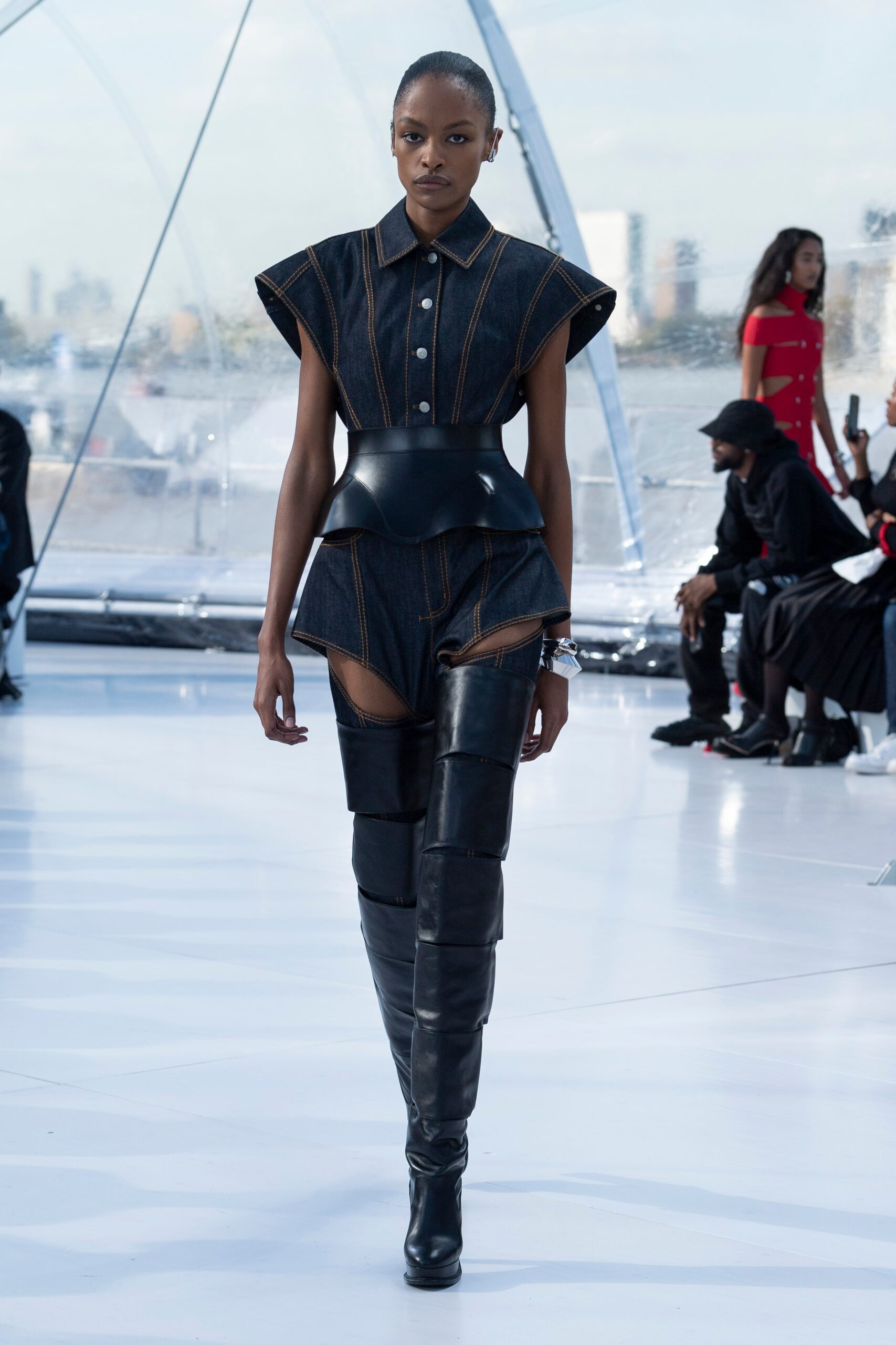 blue denim jumpsuit with black belt
