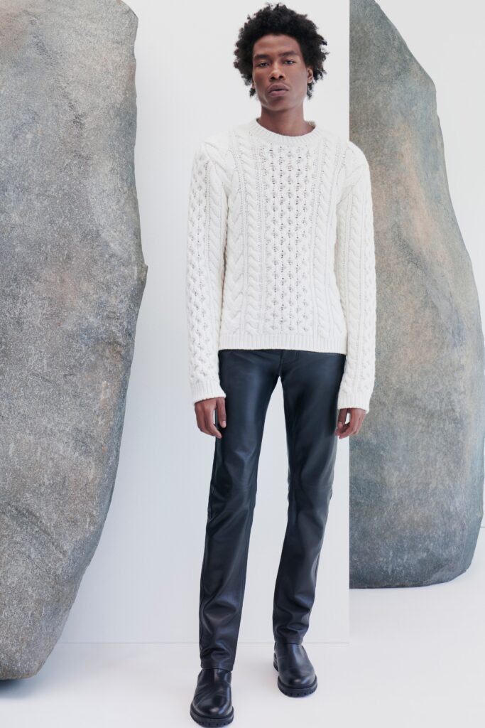 white wool sweater and black leather pants