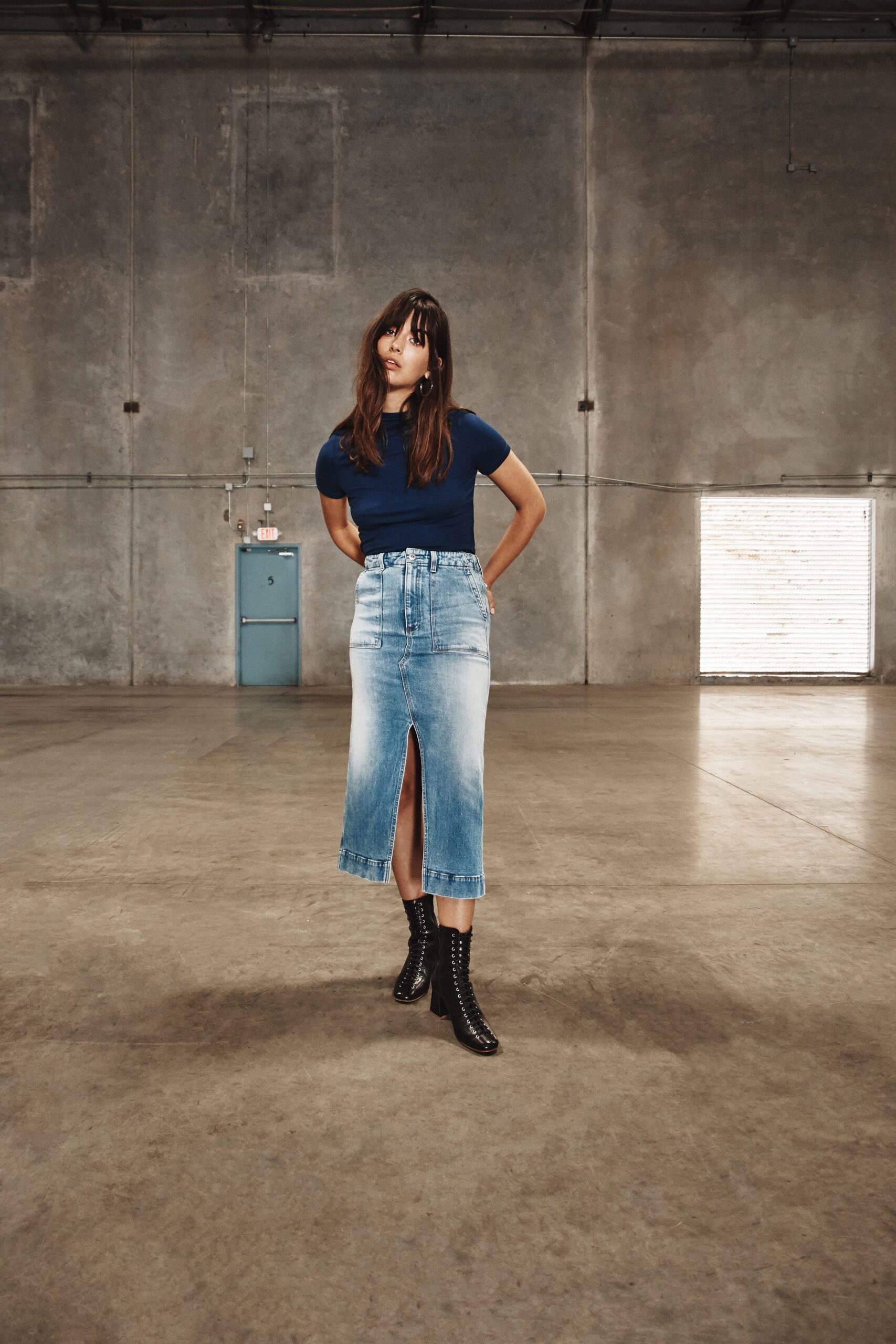 blue fitted top and denim midi skirt