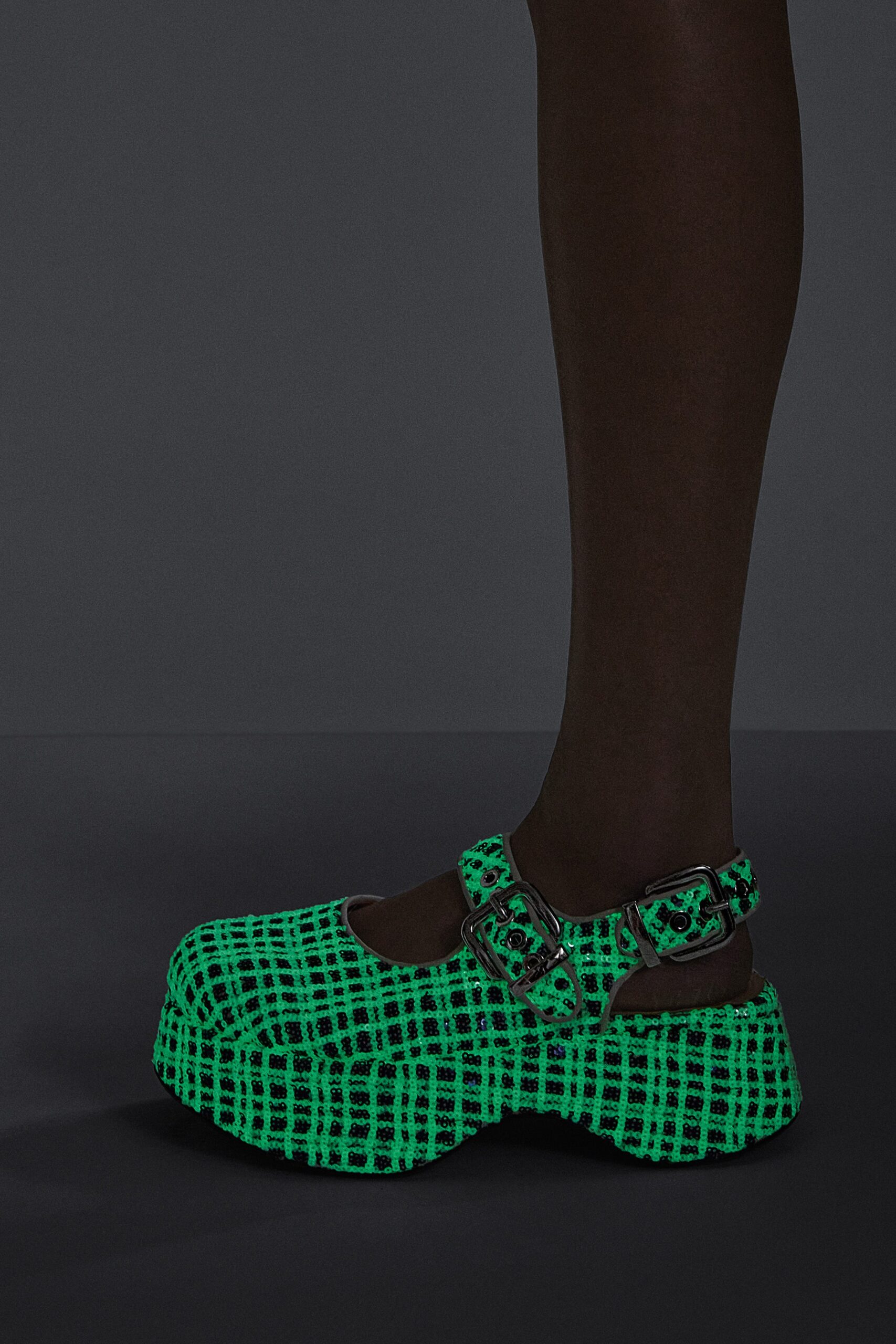 green and black checked shoes