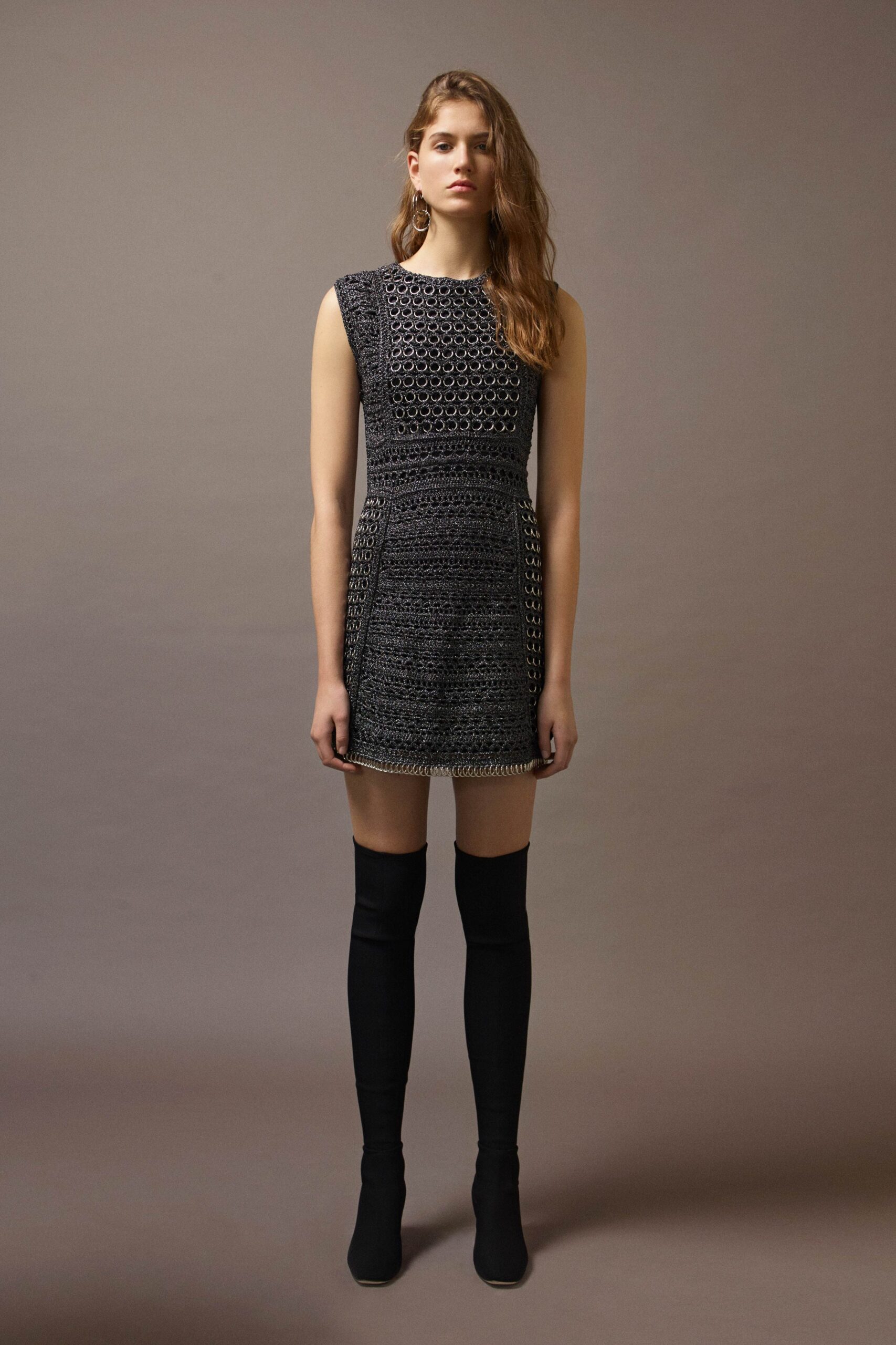 black fitted mini dress with boots