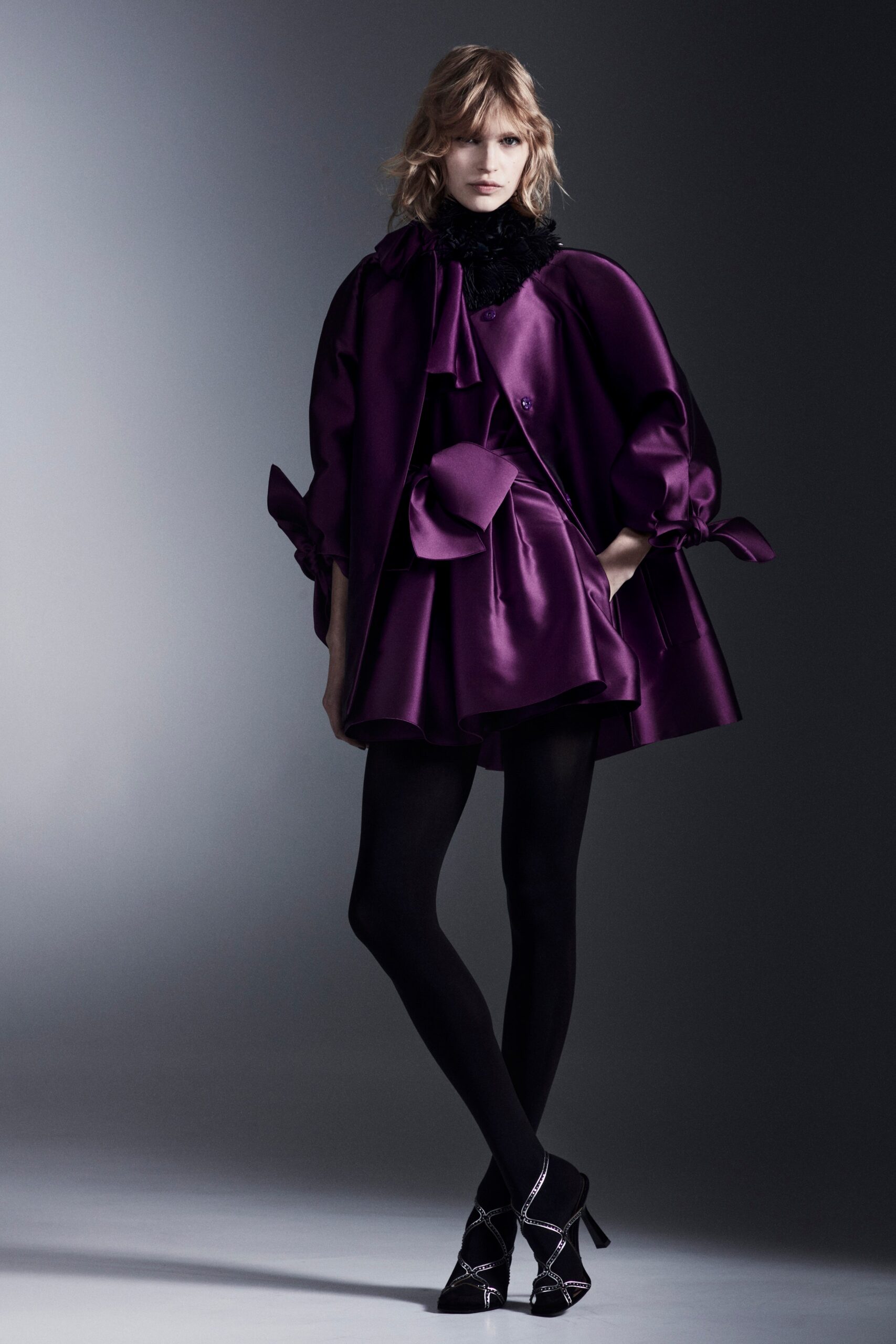 purple silk mini dress and oversized coat