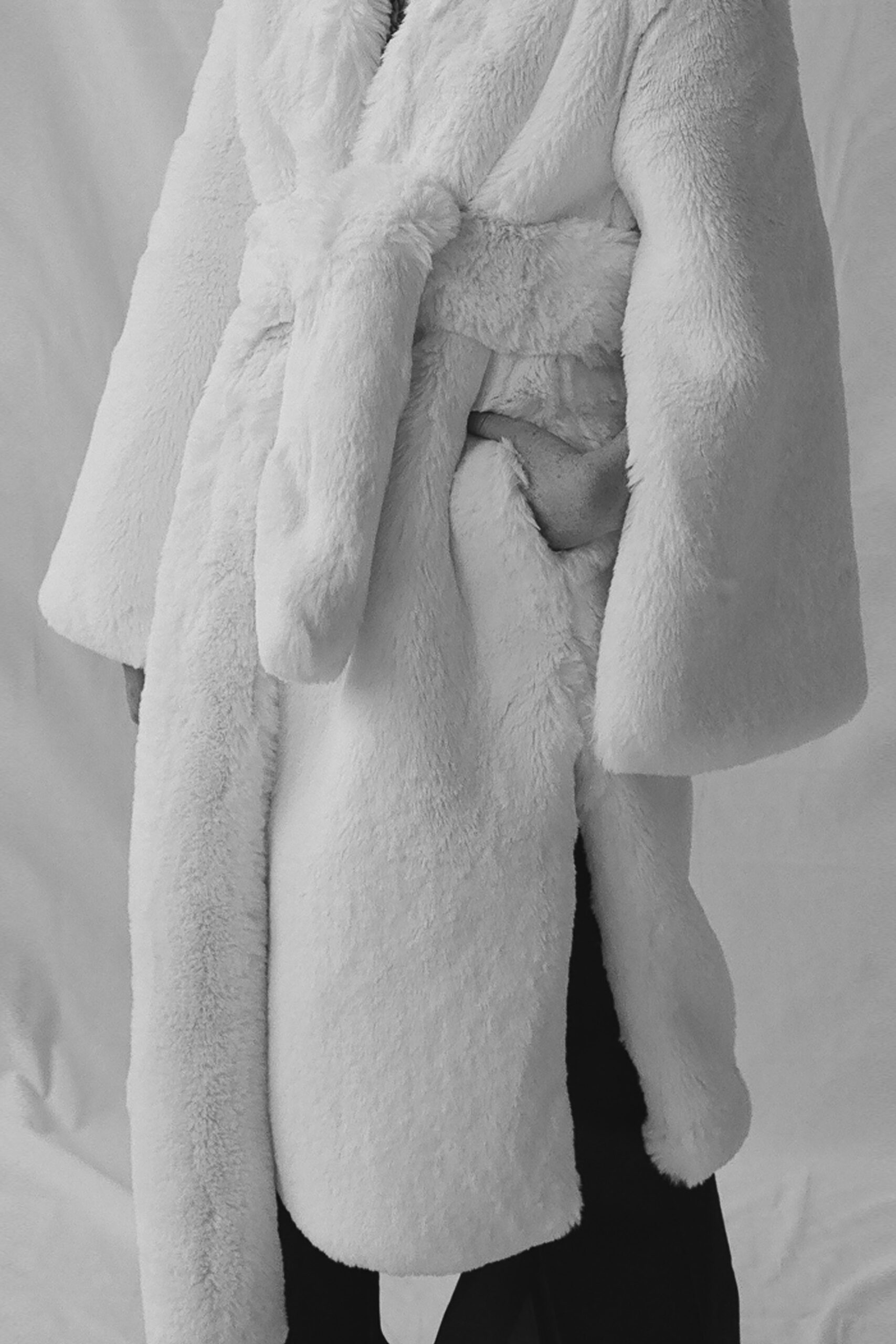 white faux-fur belted coat