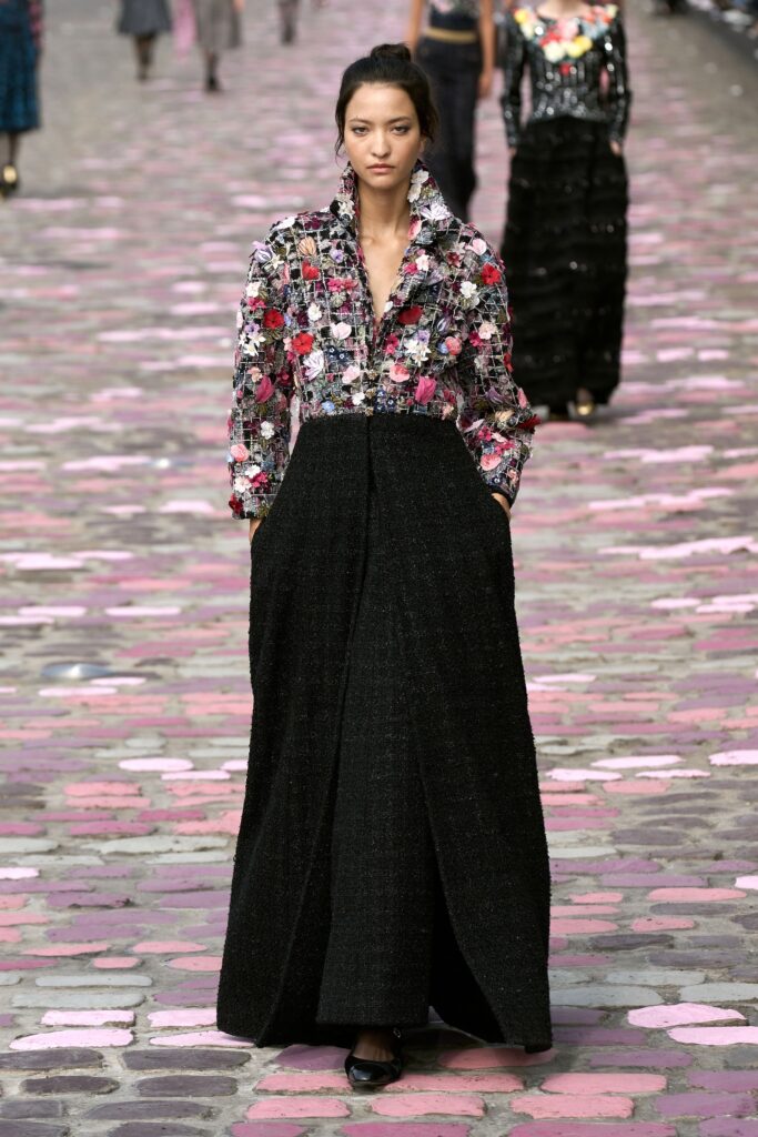 A relaxed multicolor floral collared dress with a flared silhouette and long sleeves.