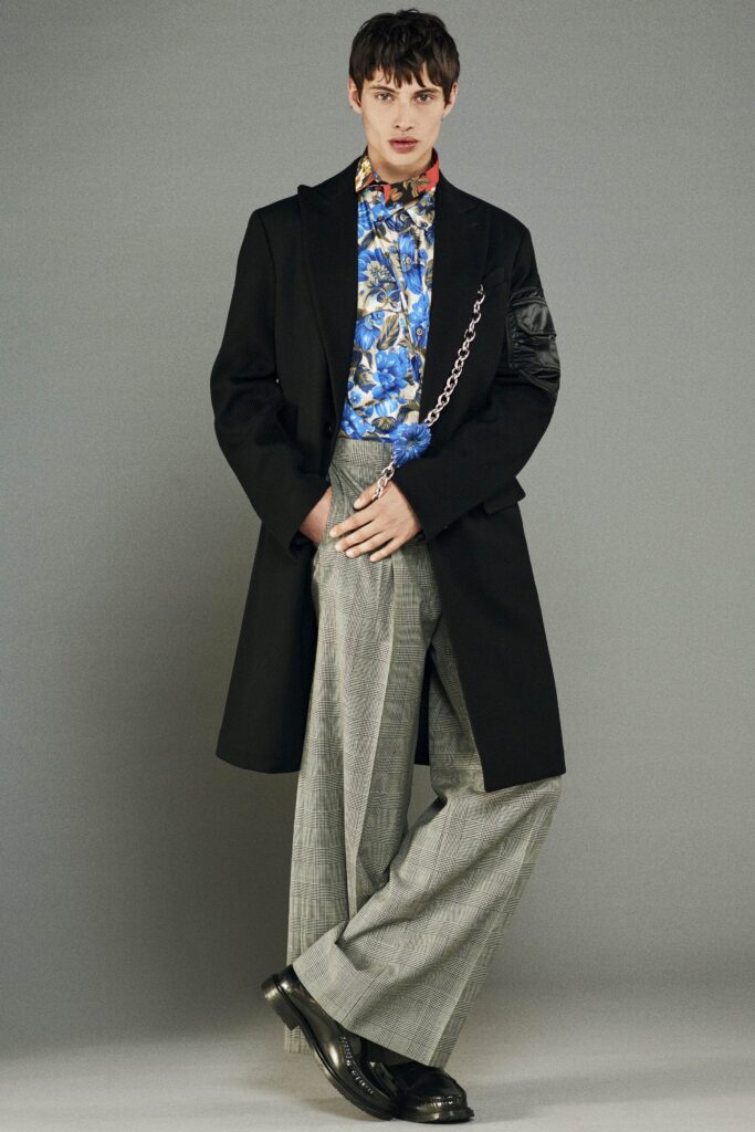 black coat blue floral shirt