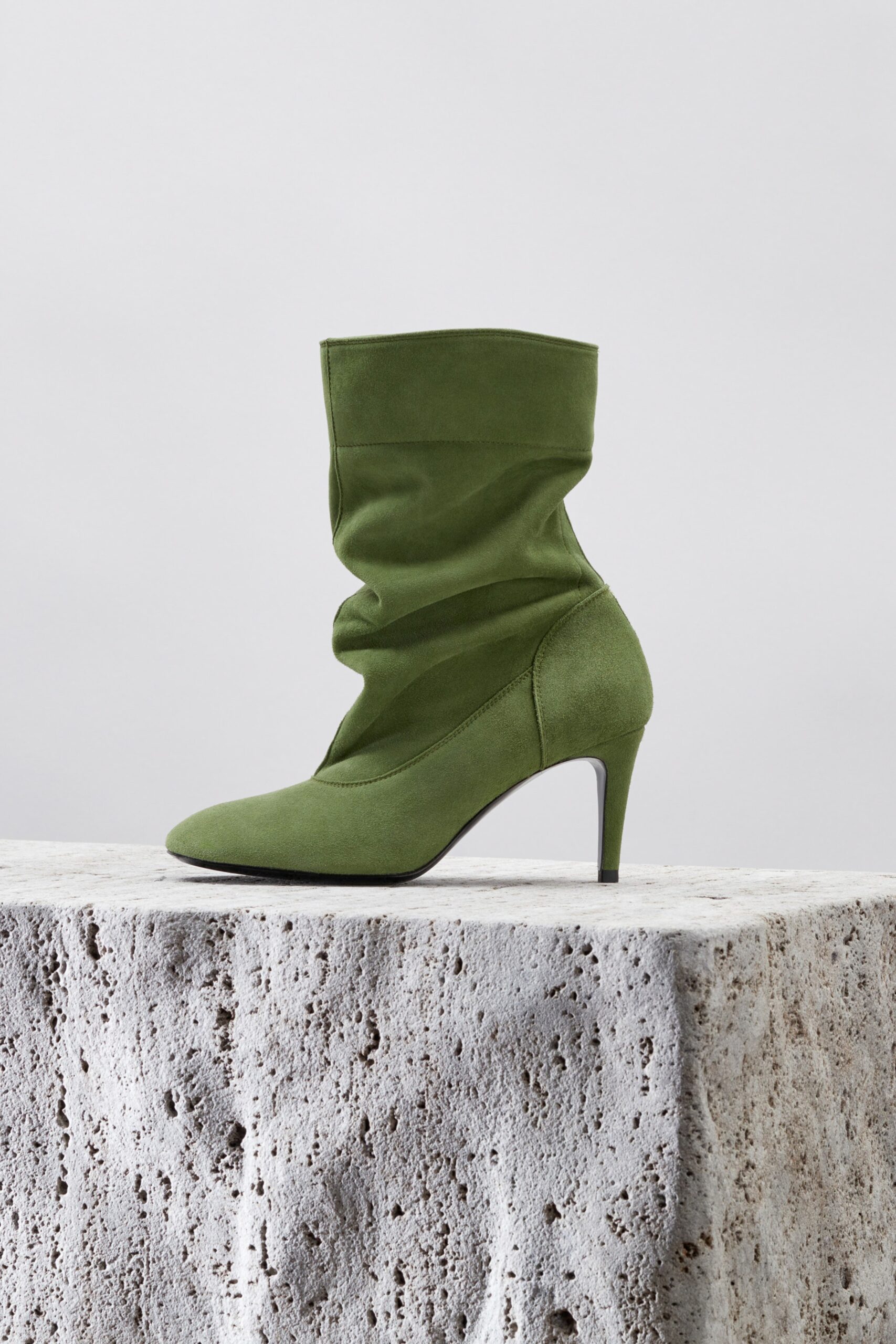 green suede fitted boots