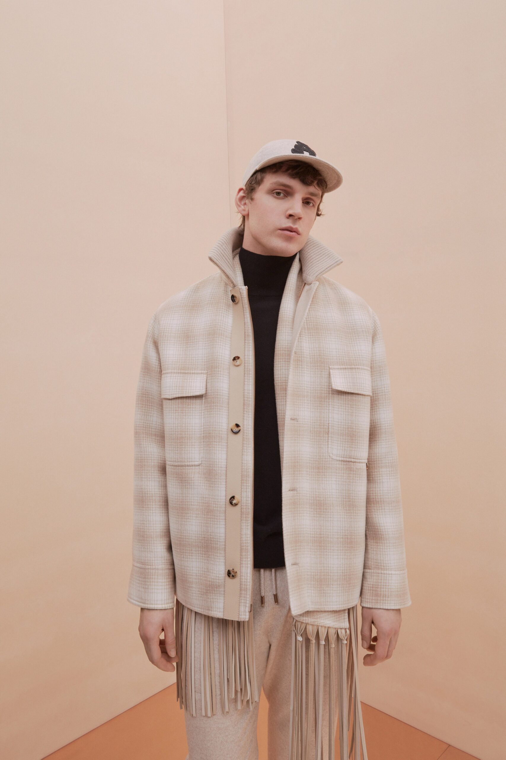 beige jacket with fringes