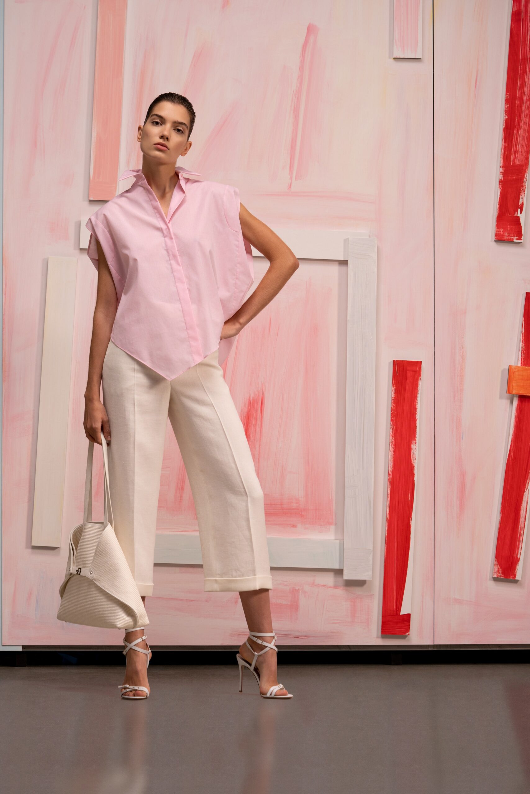 pink relaxed shirt with white pants
