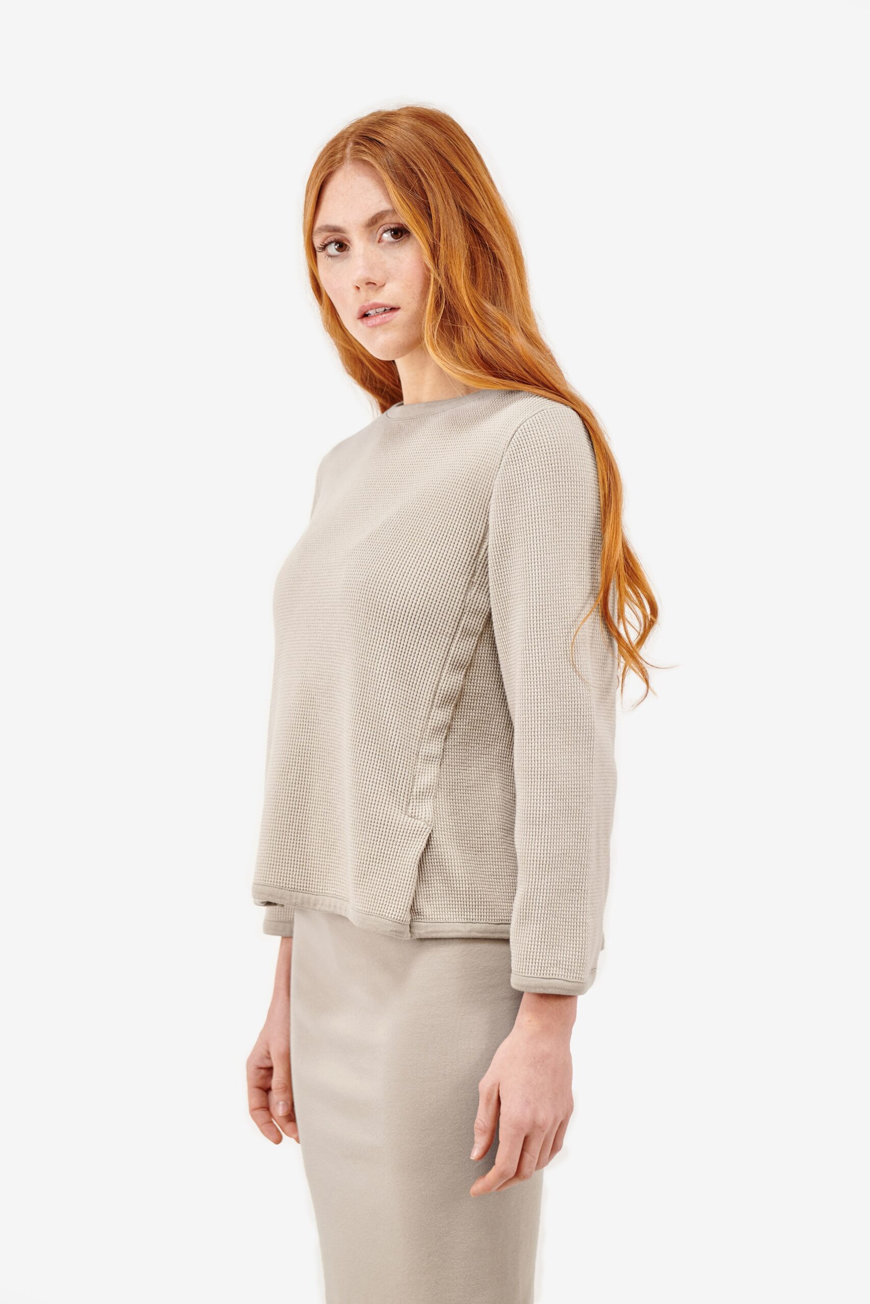 beige relaxed top and fitted skirt