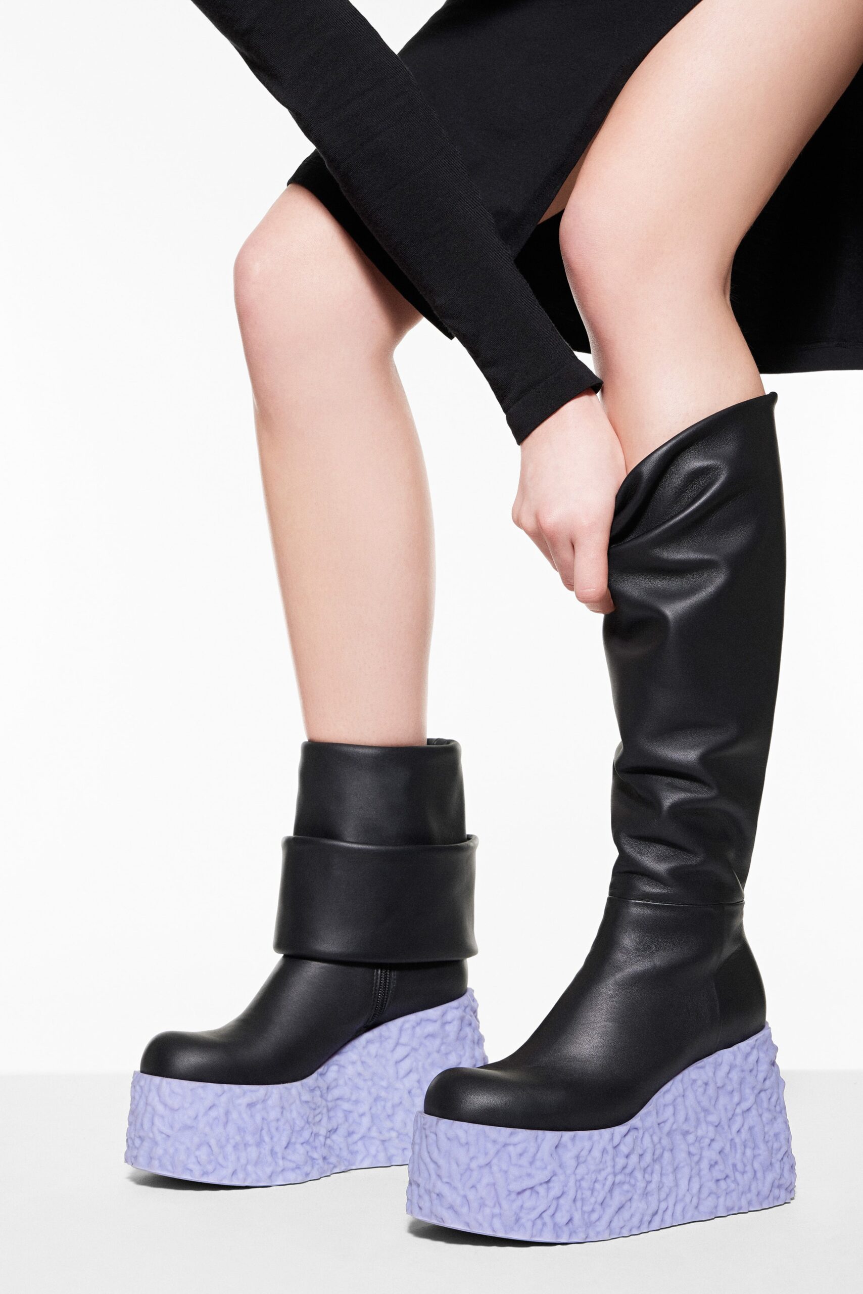 black fitted midi dress with boots