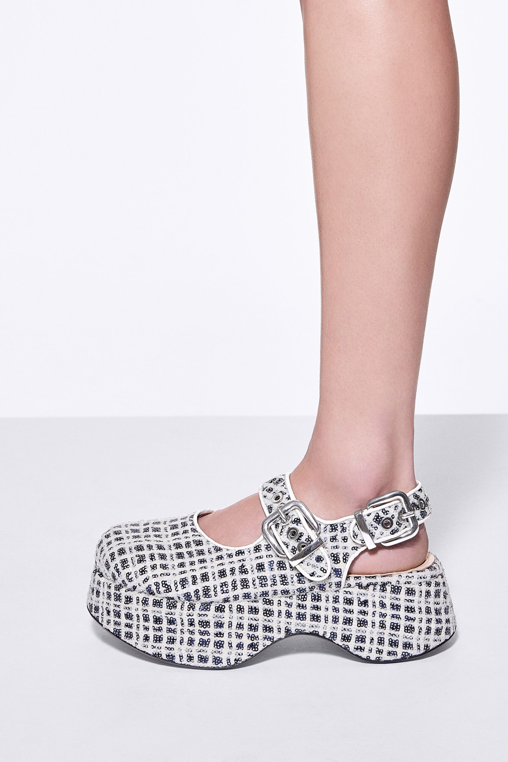 checked white and black shoes