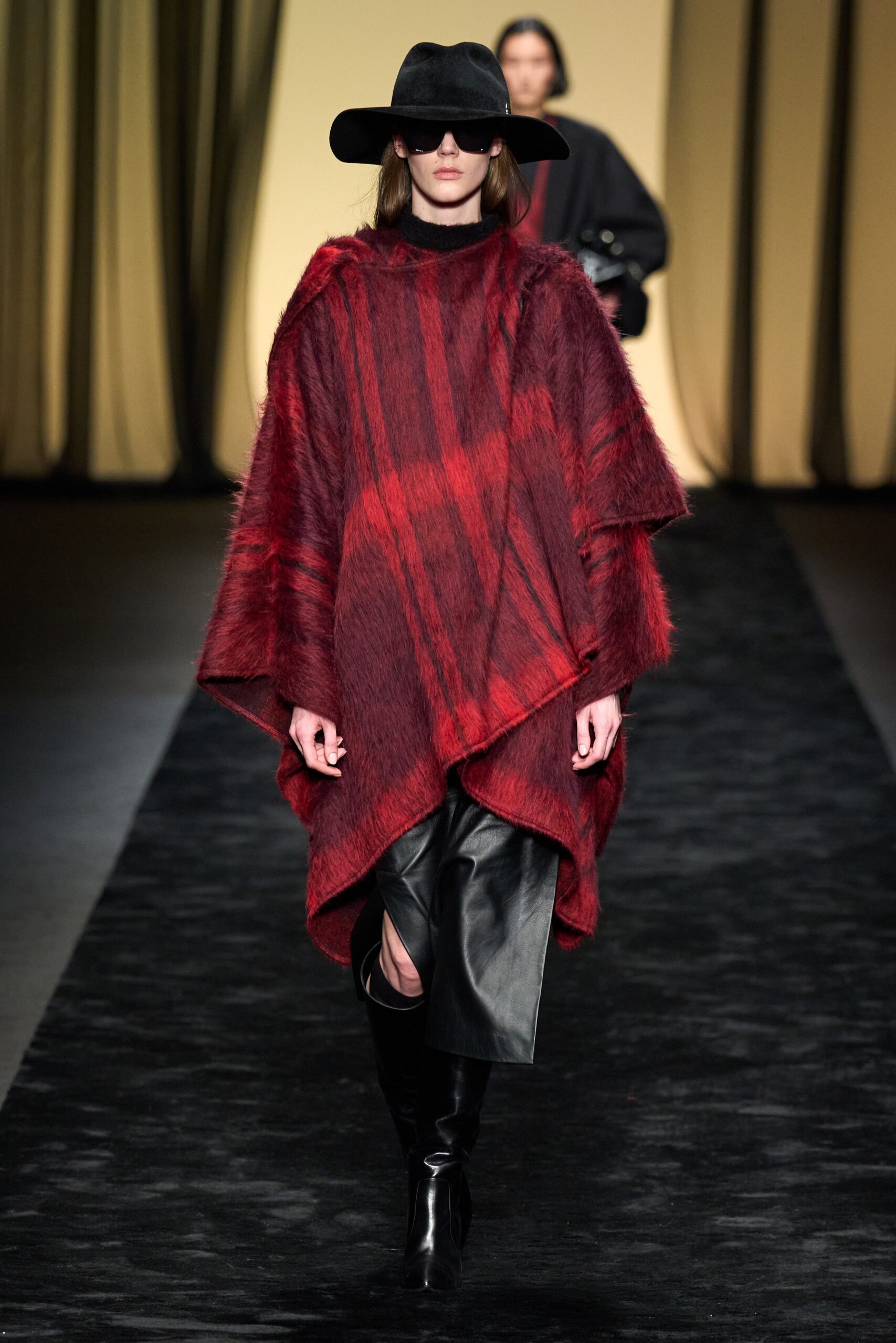 red wool poncho with leather pants