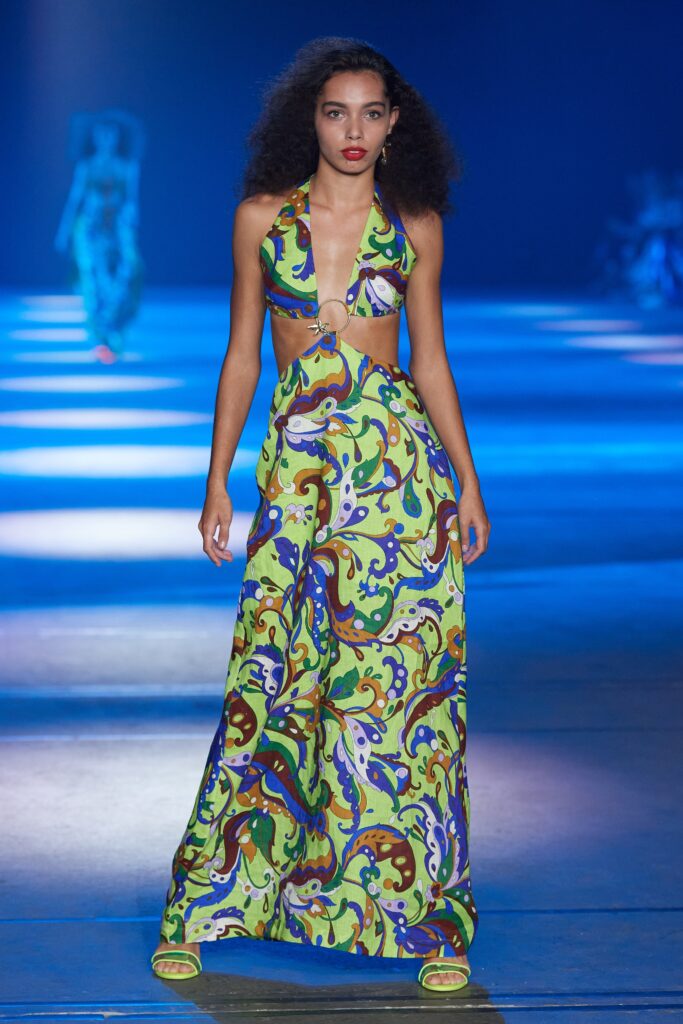 A relaxed printed halter dress featuring vibrant colors and a flowing silhouette.