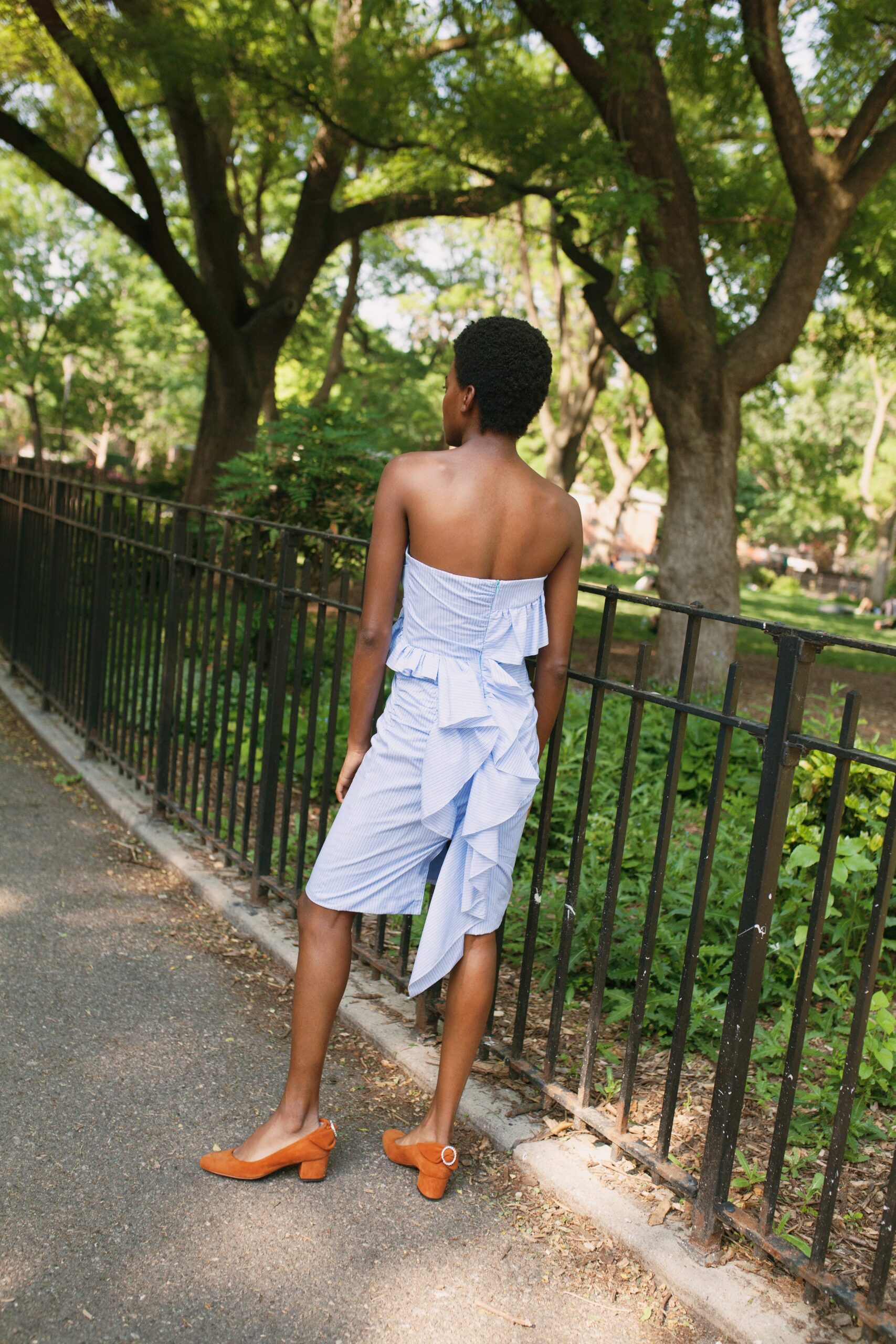 blue and white strapless ruffled dress