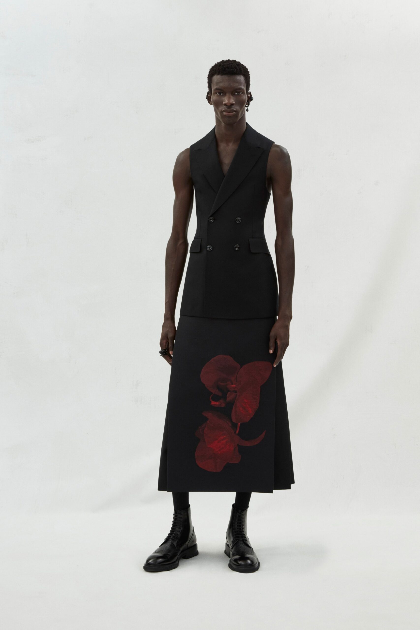 black fitted blazer with printed skirt