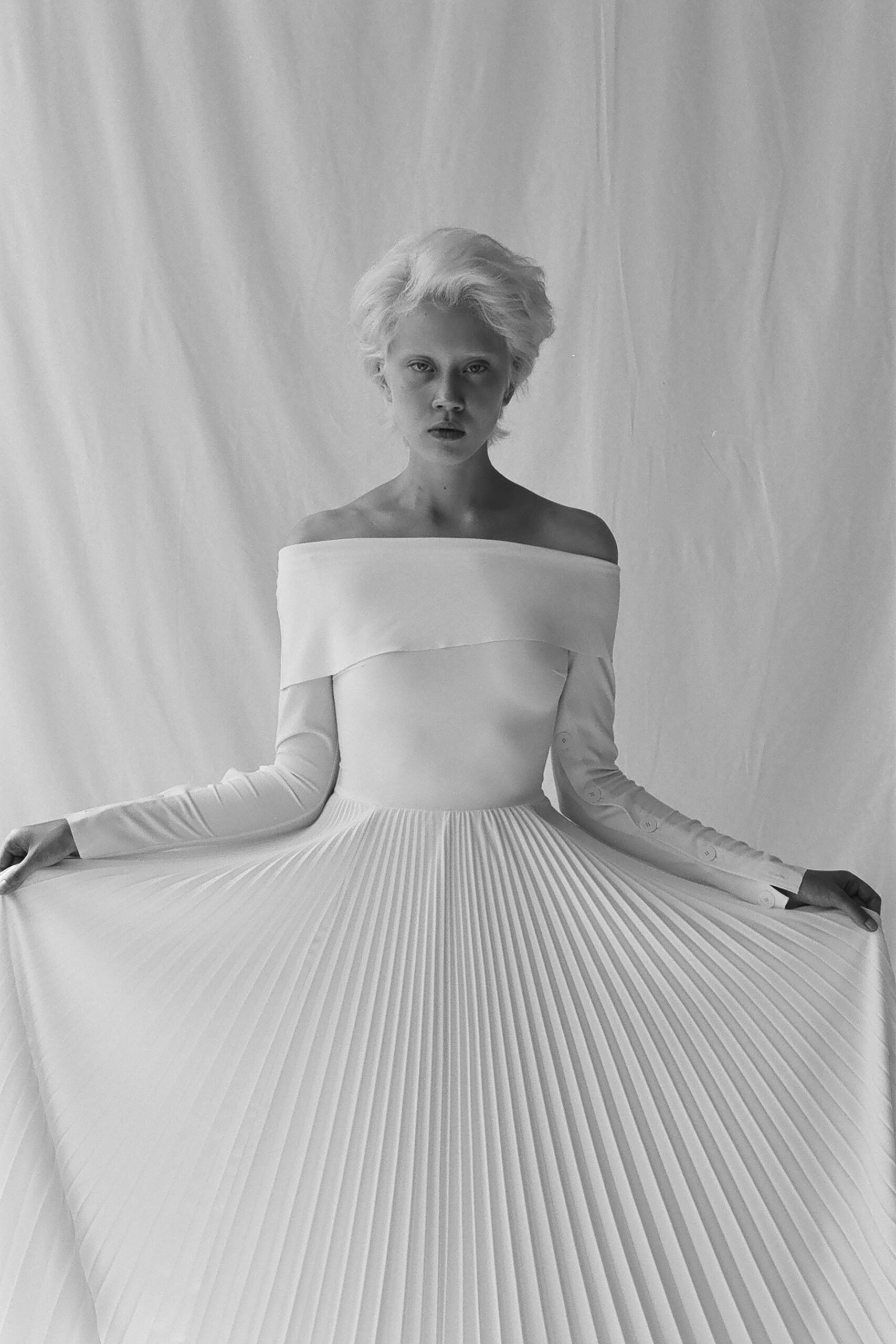 white silk off-shoulder gown