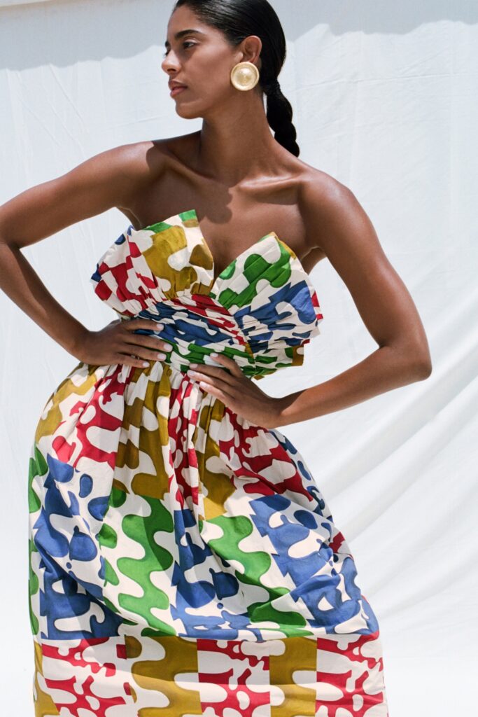 A relaxed multicolor strapless dress with pleated detailing for a vibrant look.
