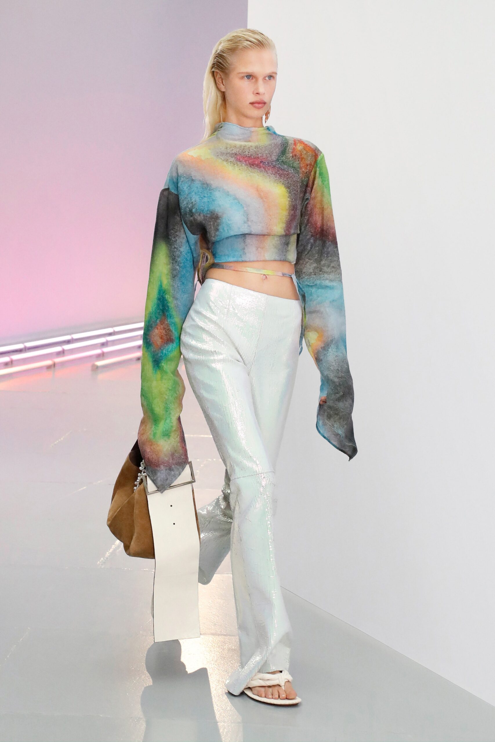 multi-colored cropped top with white pants