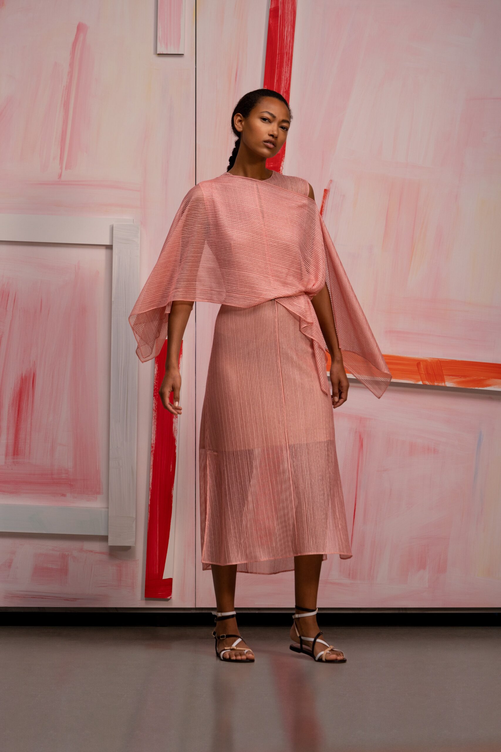 pink chiffon sleeveless high-neck relaxed pleated flowing top