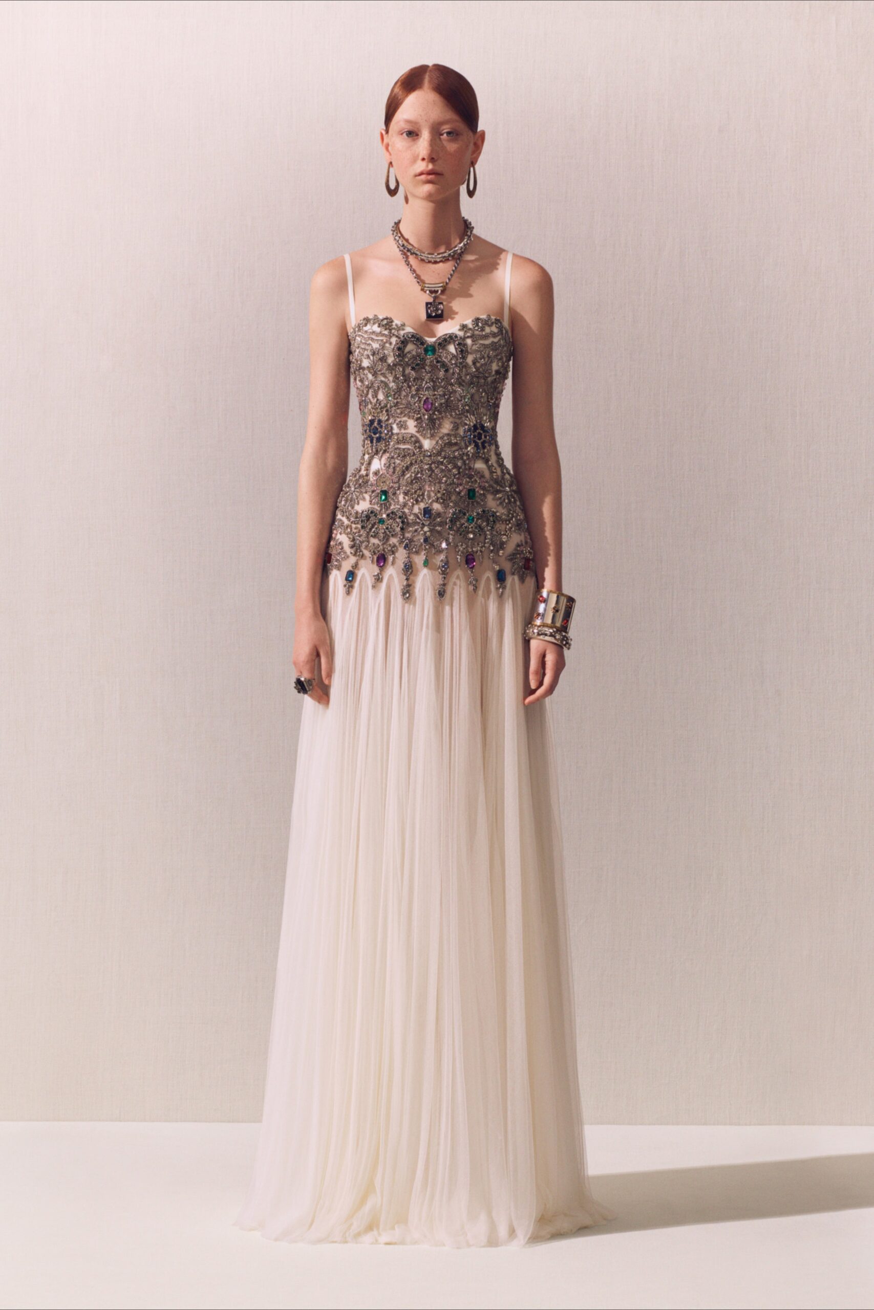 white silk embellished gown