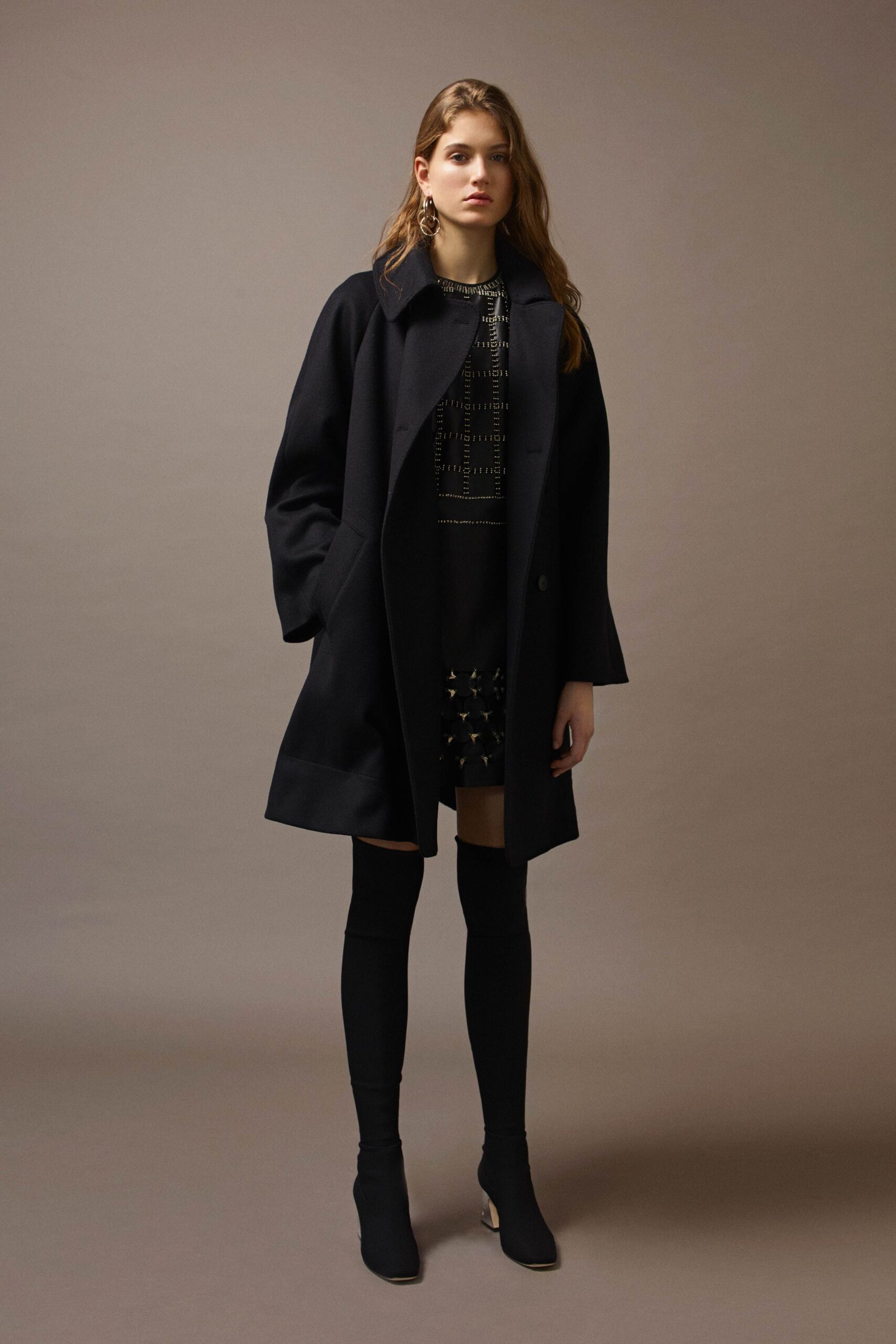 black wool coat and mini dress