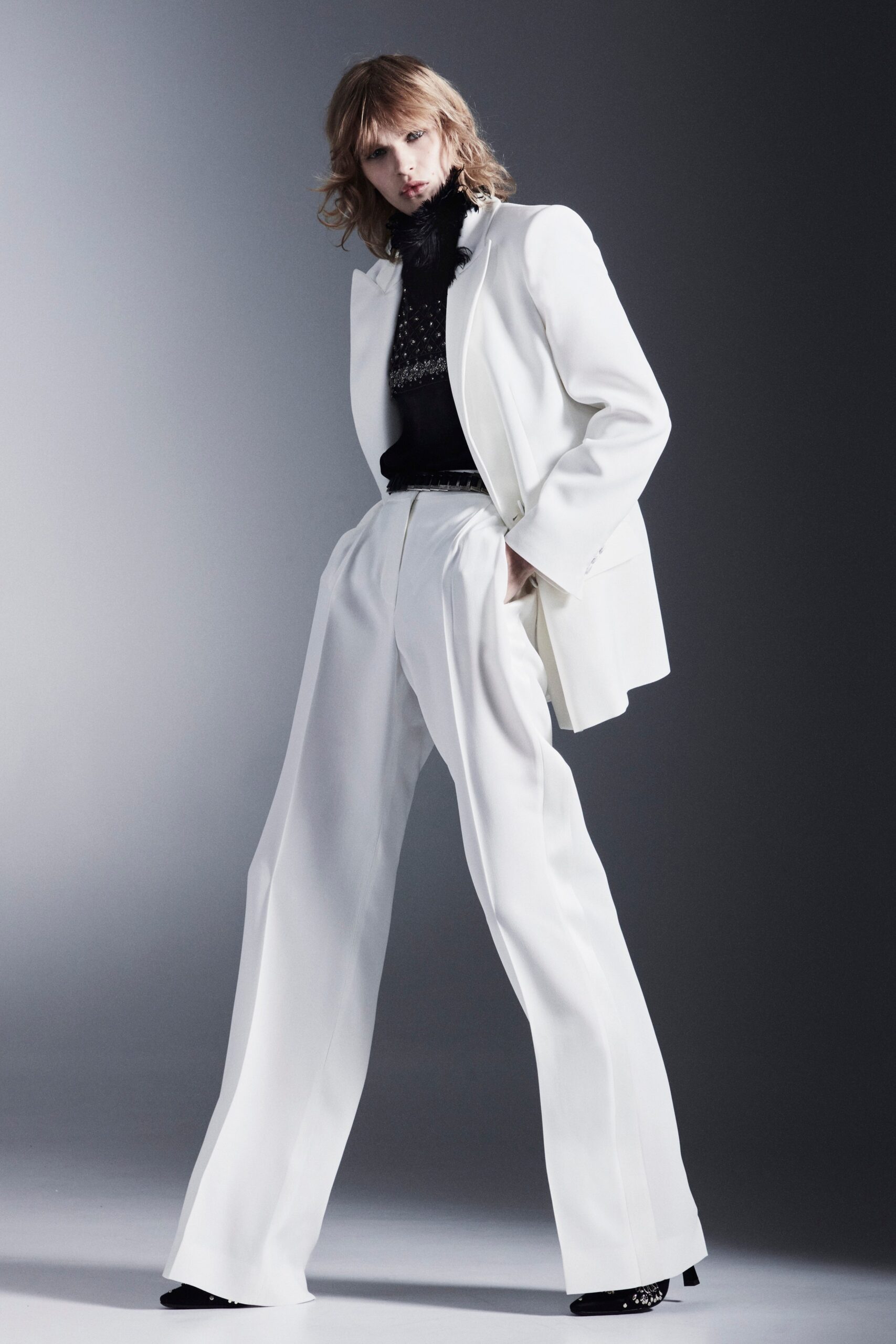 white tailored blazer with black top