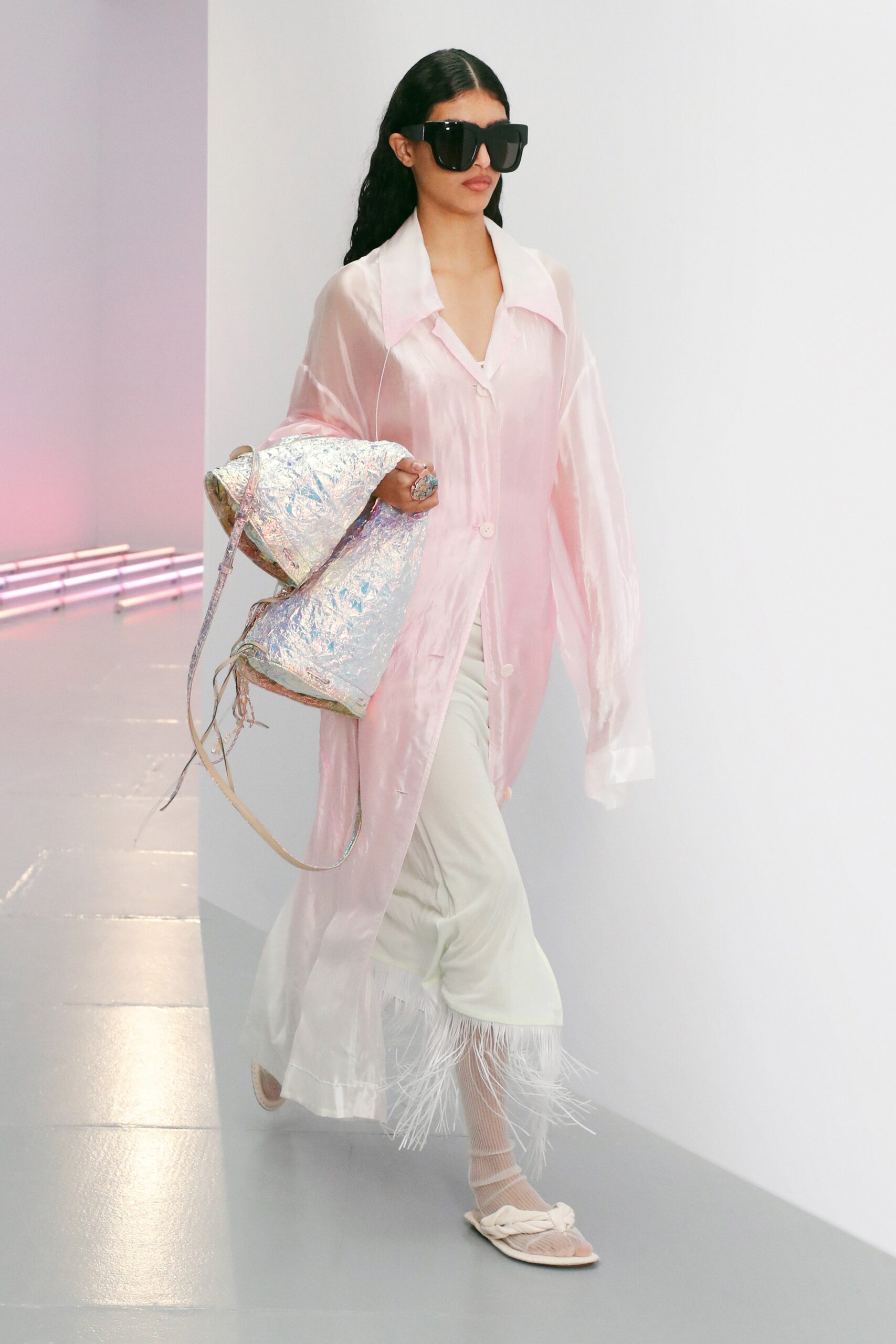 pink silk coat with white pants