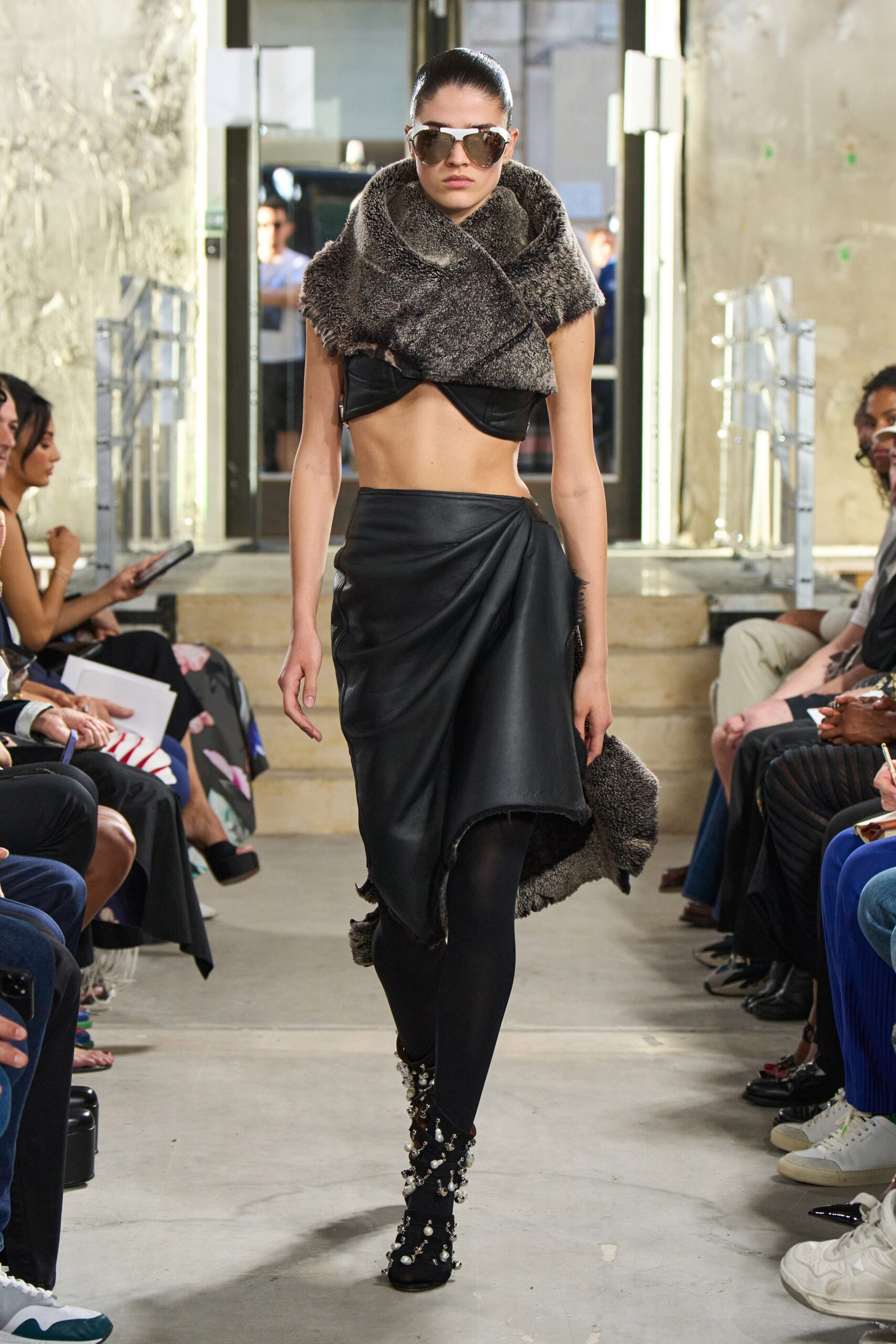 black fitted crop top and skirt