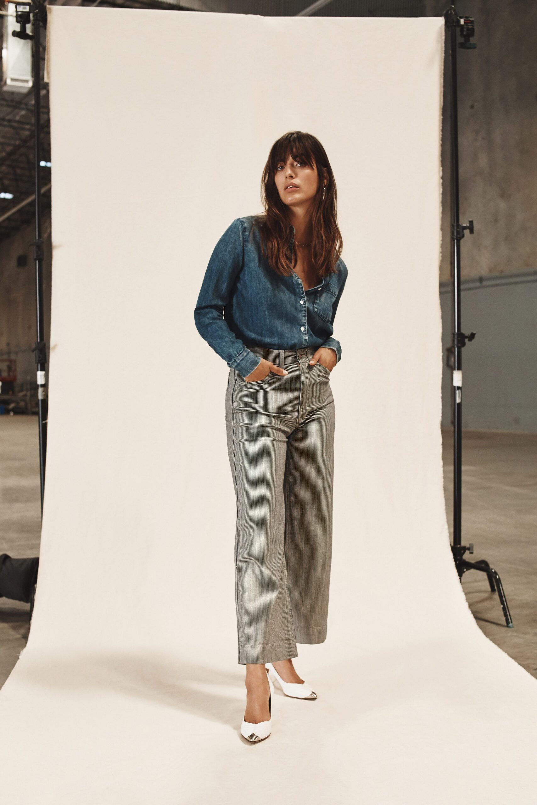 blue denim shirt with gray wide-leg pants