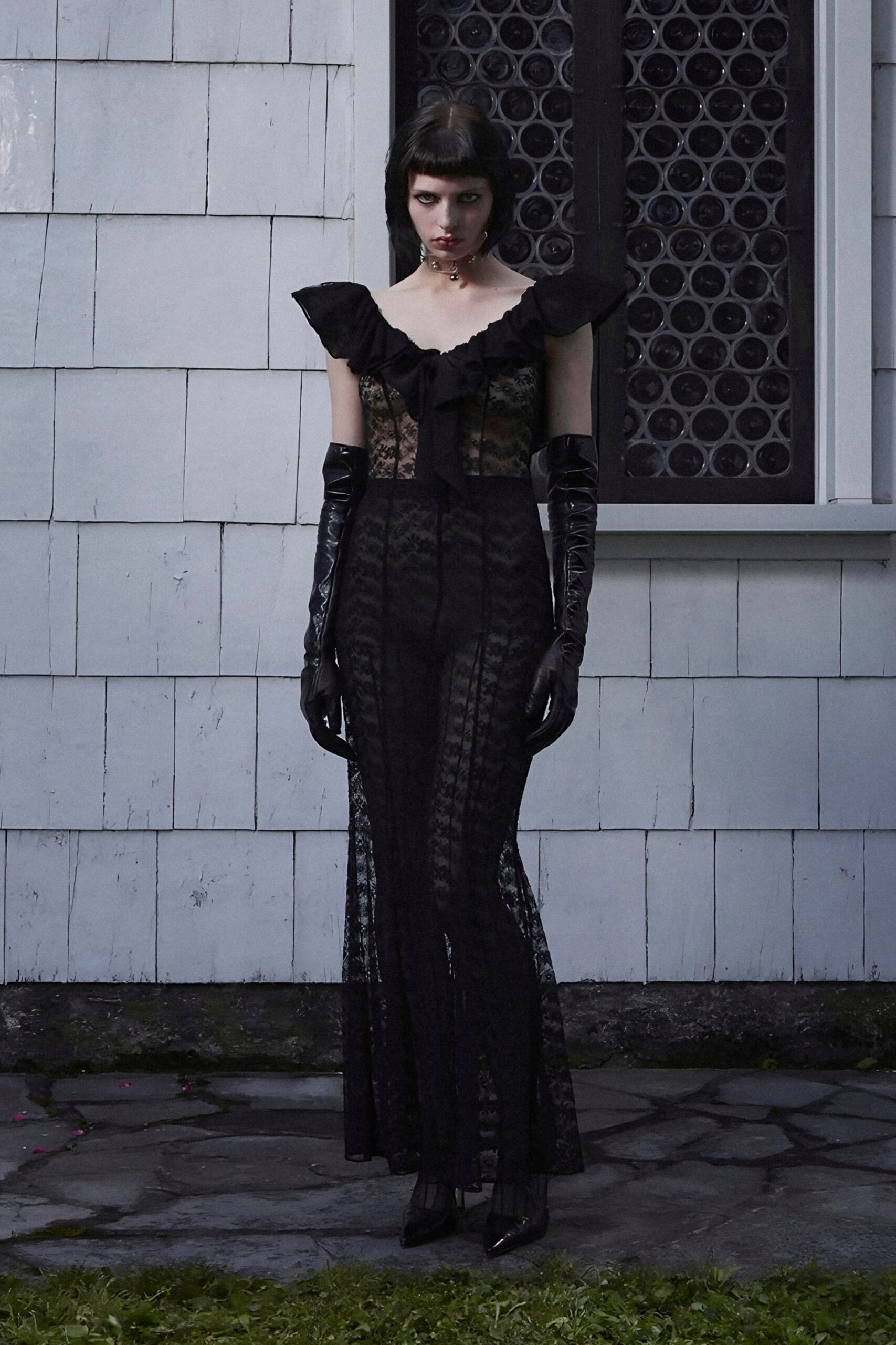 black lace sleeveless v-neck fitted ruffled tiered gown