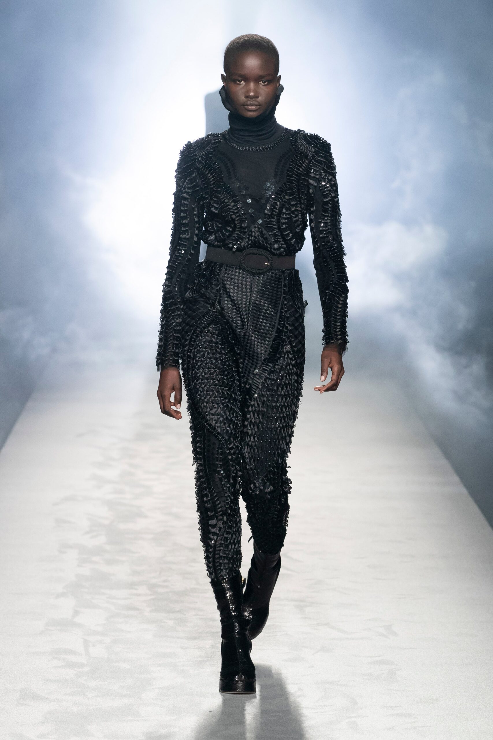 black fitted vinyl catsuit