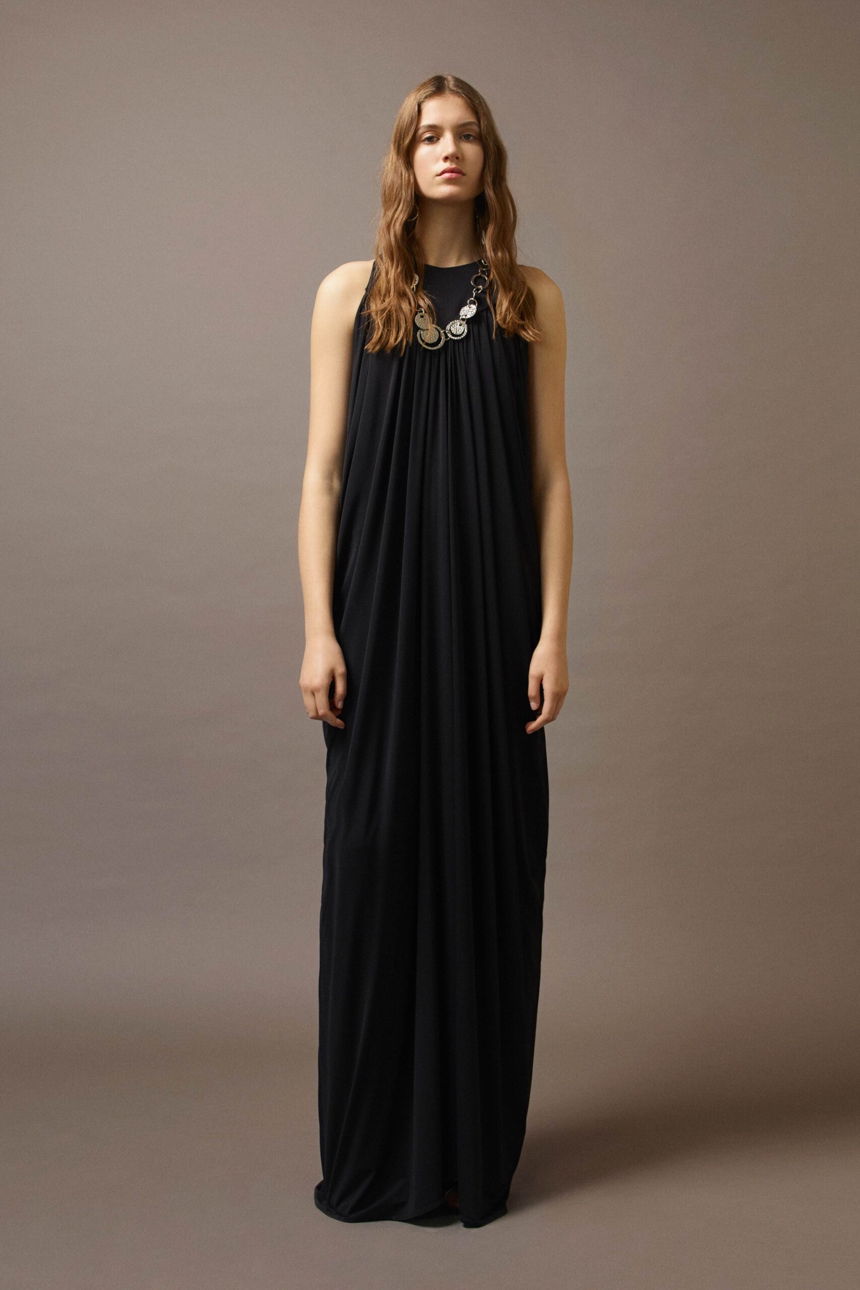 black relaxed sleeveless gown