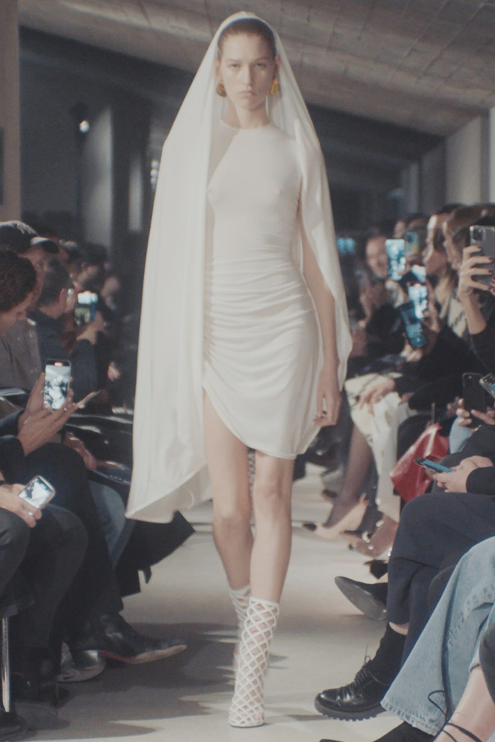 white silk sleeveless high-neck fitted ruched flowing dress